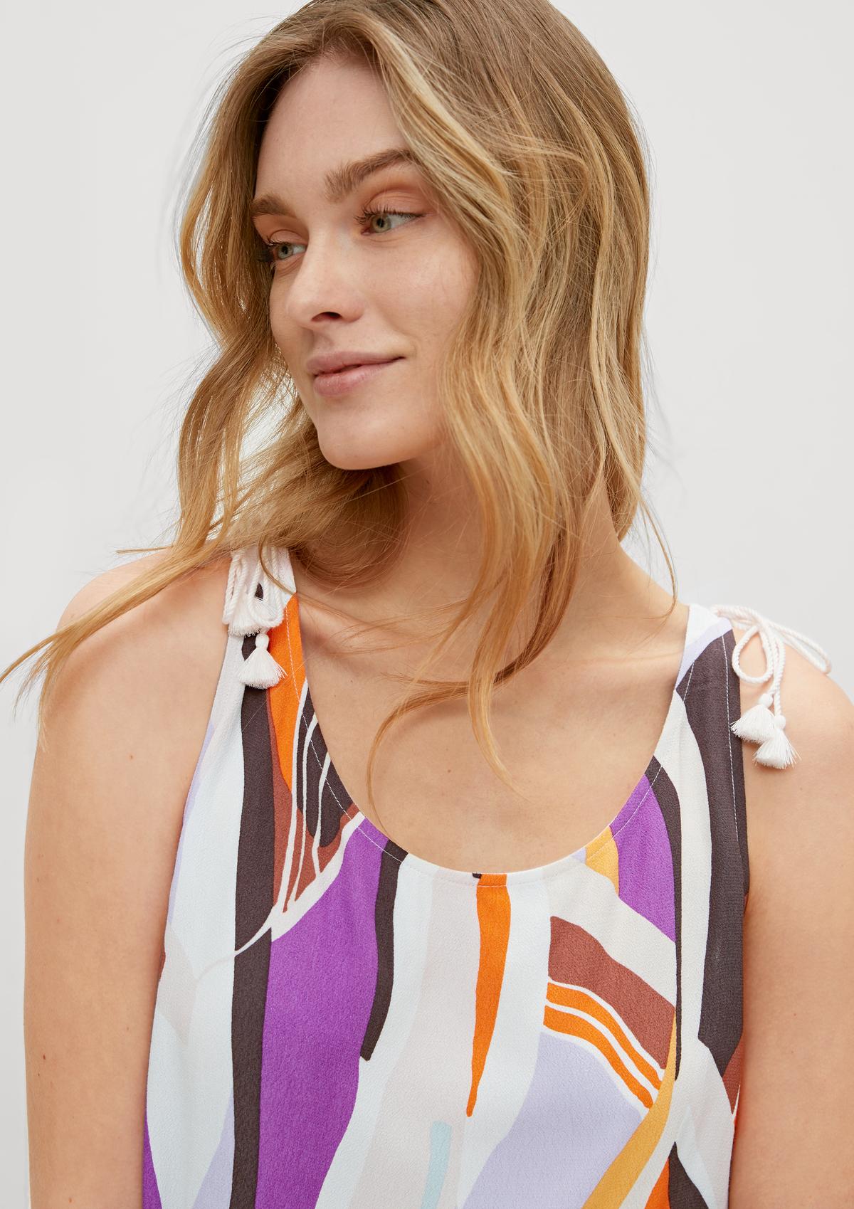 comma Top with an abstract all-over pattern