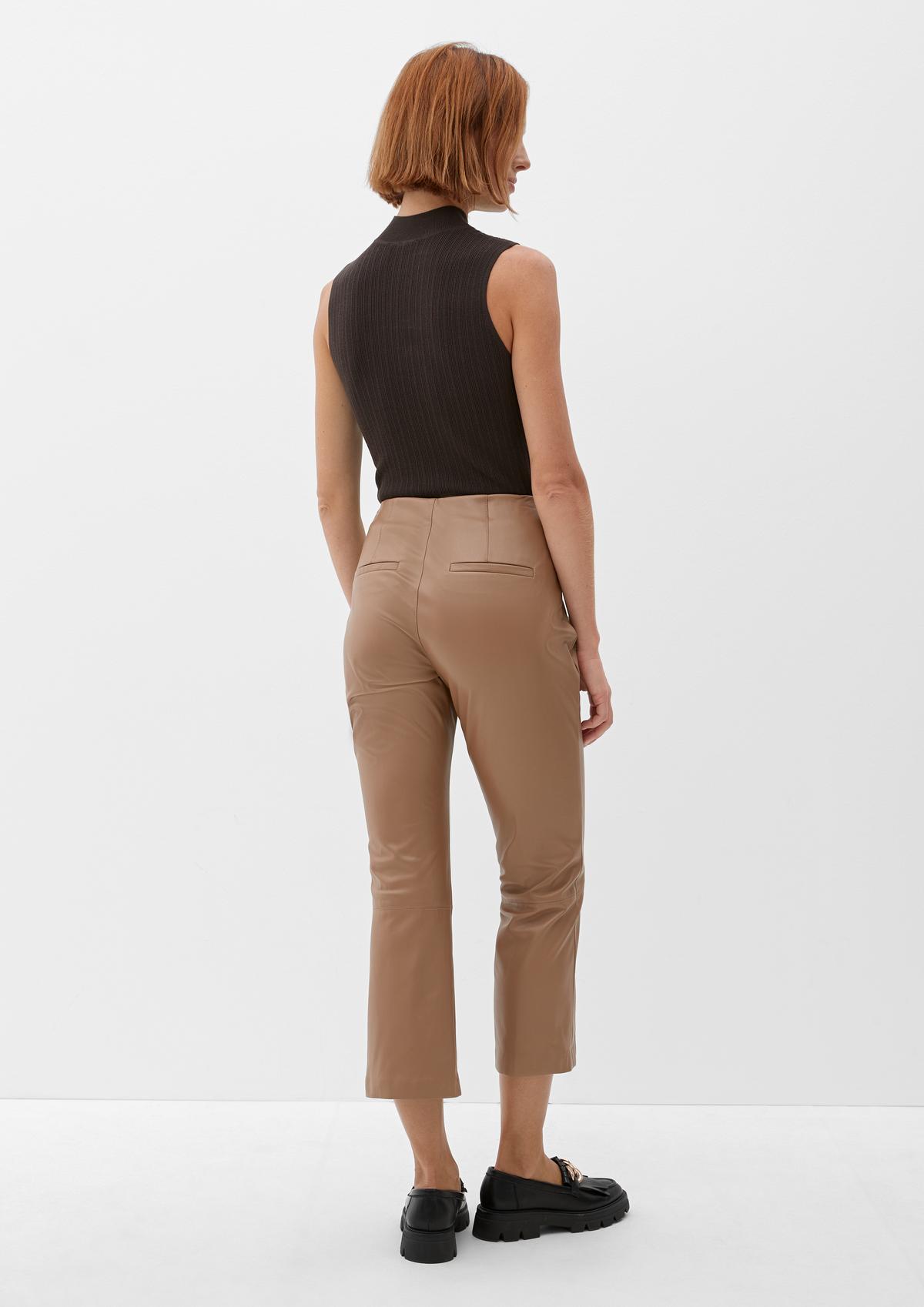 High-waisted slim faux leather trousers