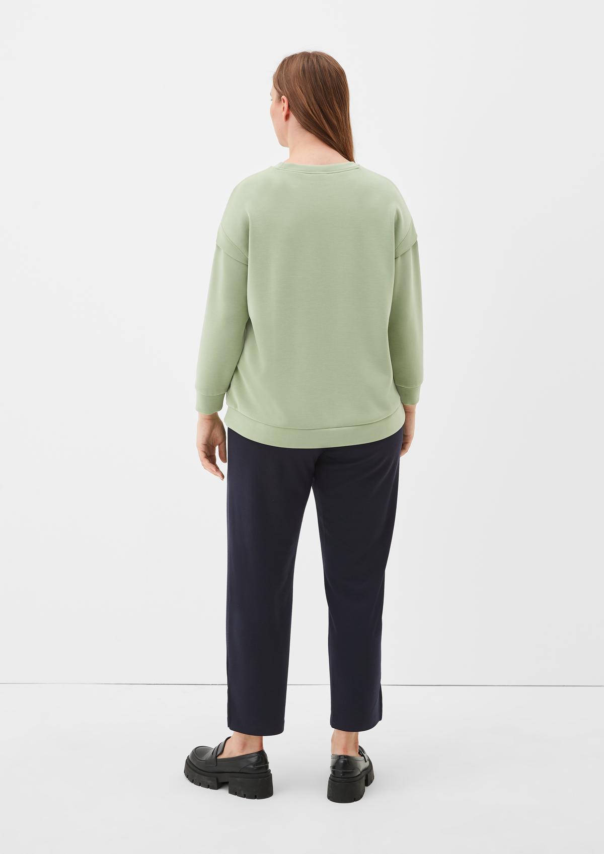 s.Oliver Scuba top in a layering look