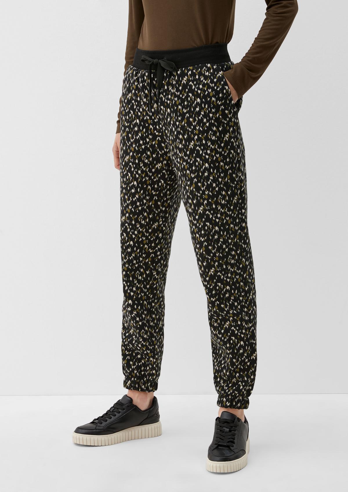 s.Oliver Tracksuit bottoms with an all-over pattern