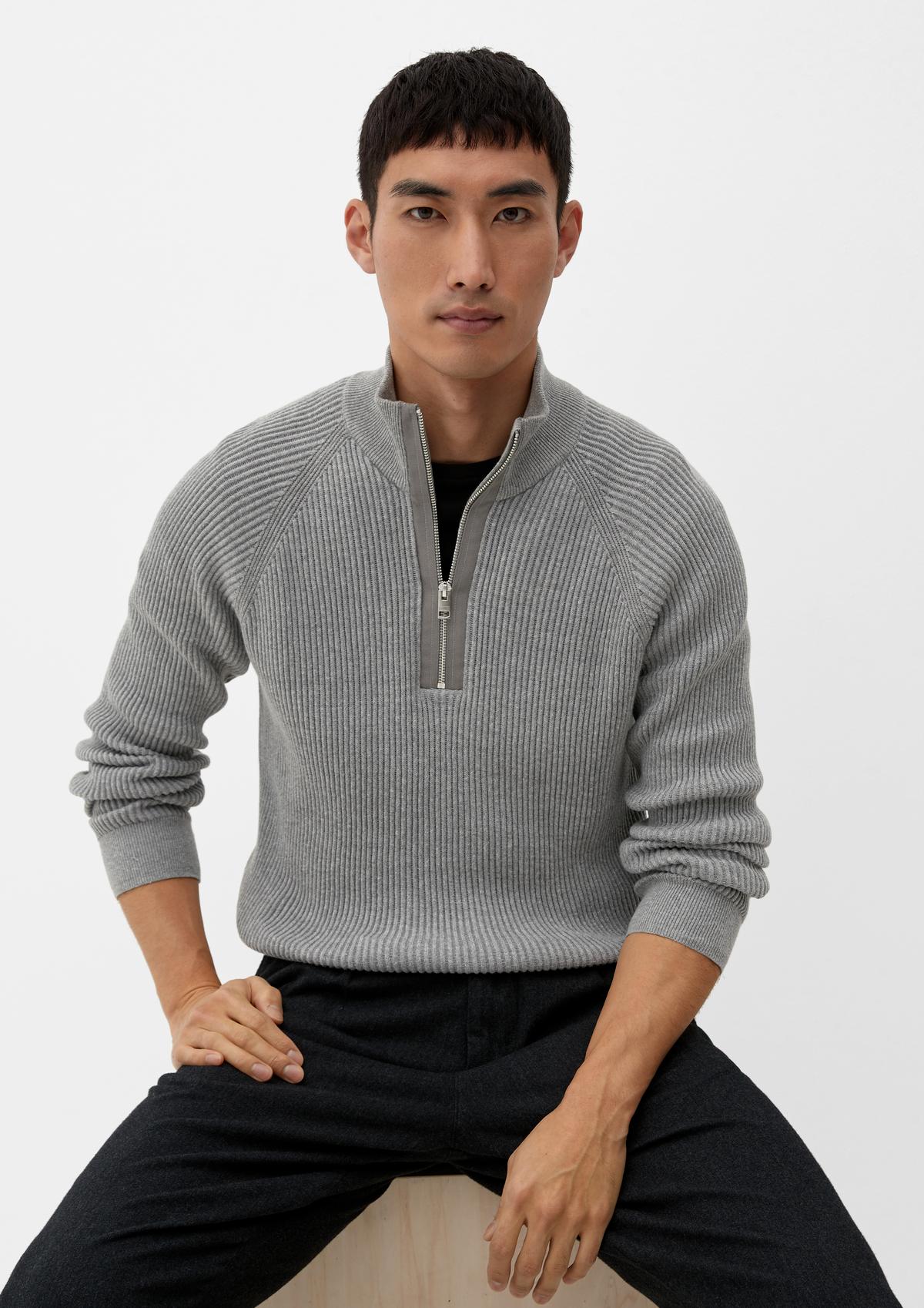 Knitted jumper with a half zip
