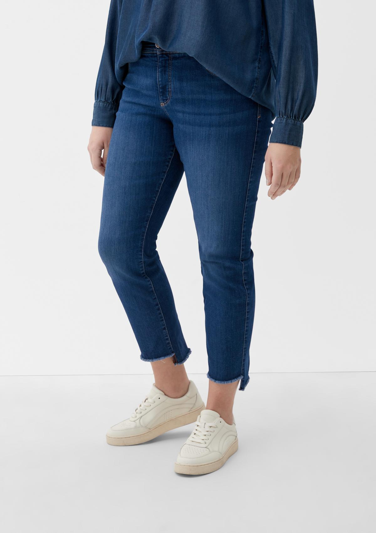 Slim: jeans met high low-zoom