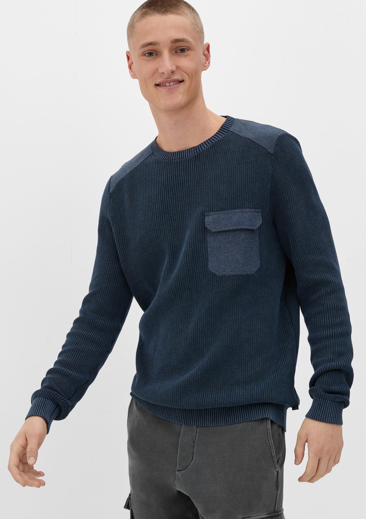 Knitted jumper with a garment dye