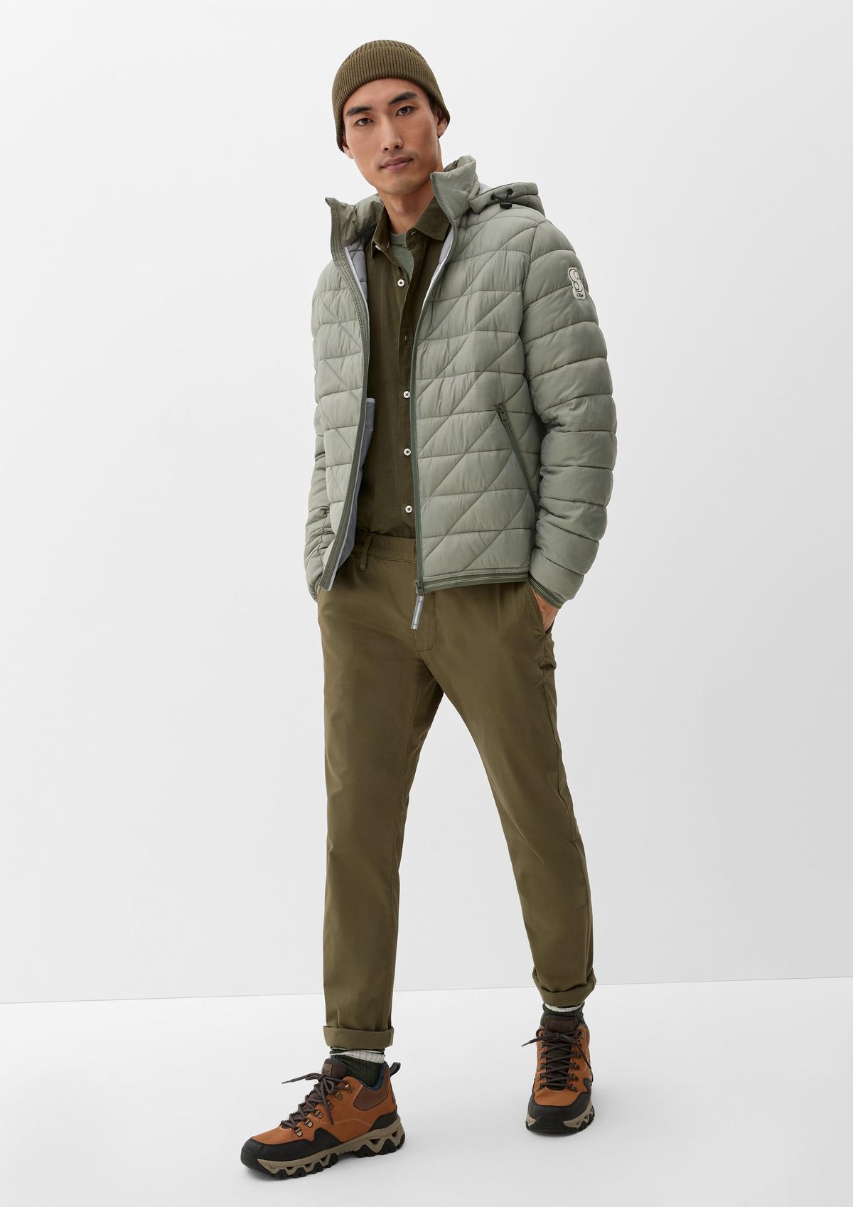 Quilted jacket with a detachable hood