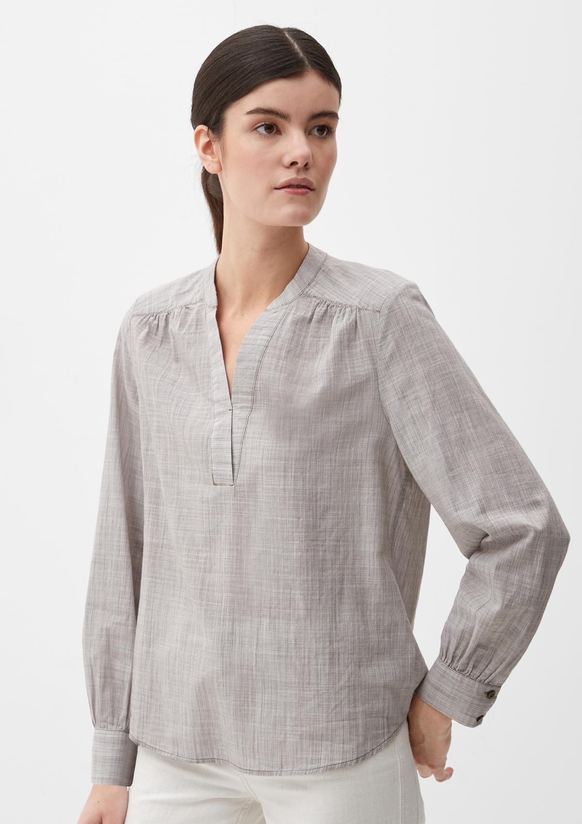 Tunic blouse with a striped pattern