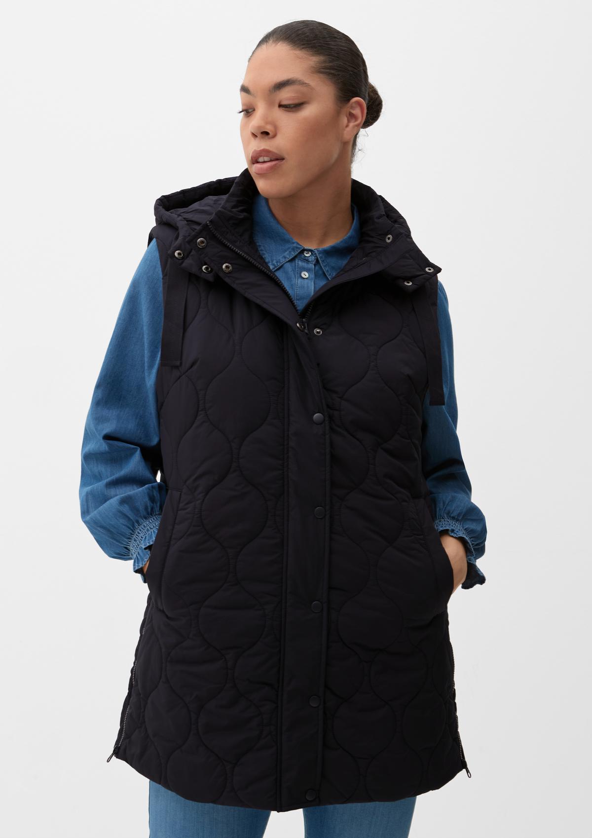 Quilted body warmer with a hood