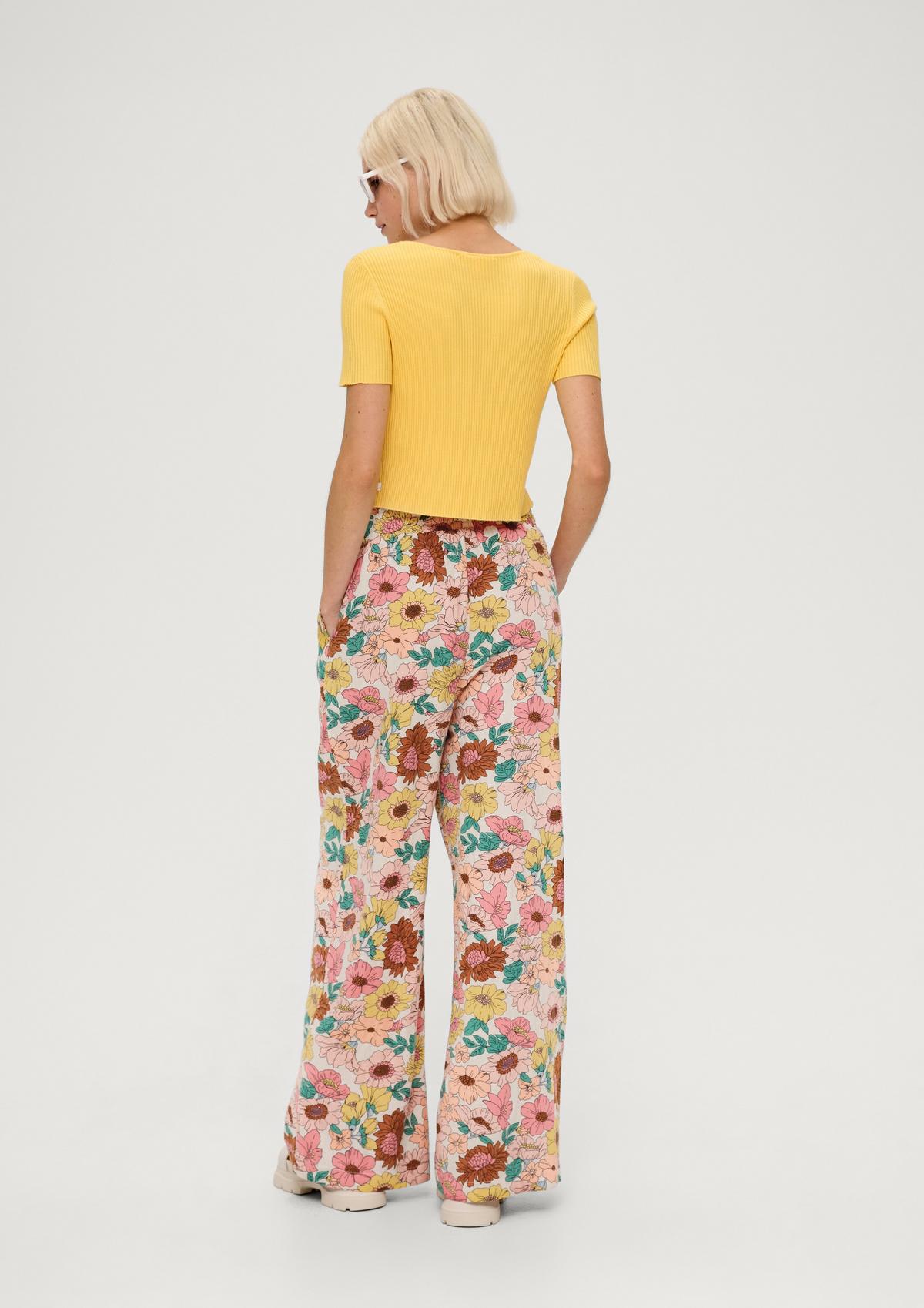 Loose fit: trousers with a floral print - beige