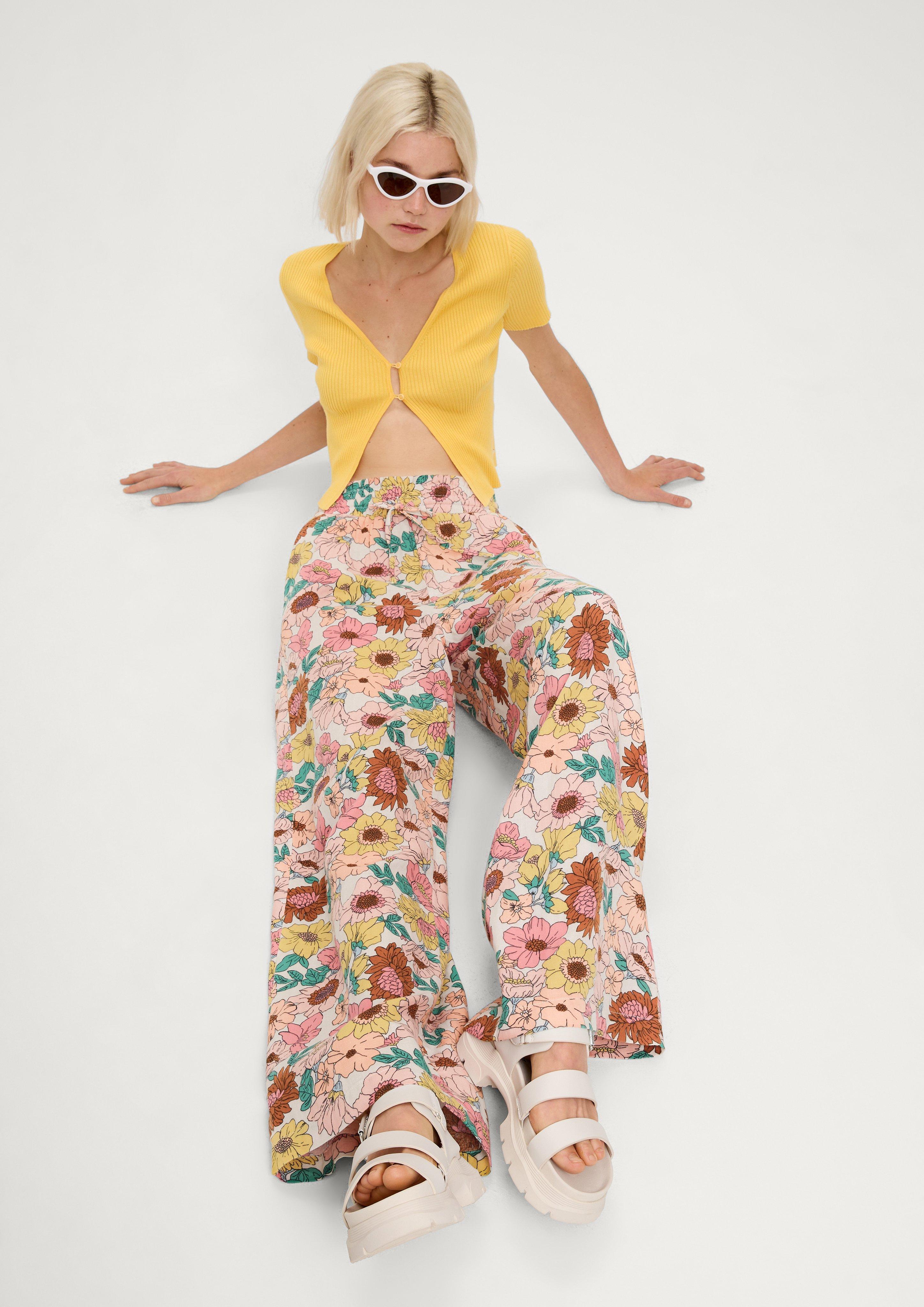 Loose fit: trousers with a floral print - beige