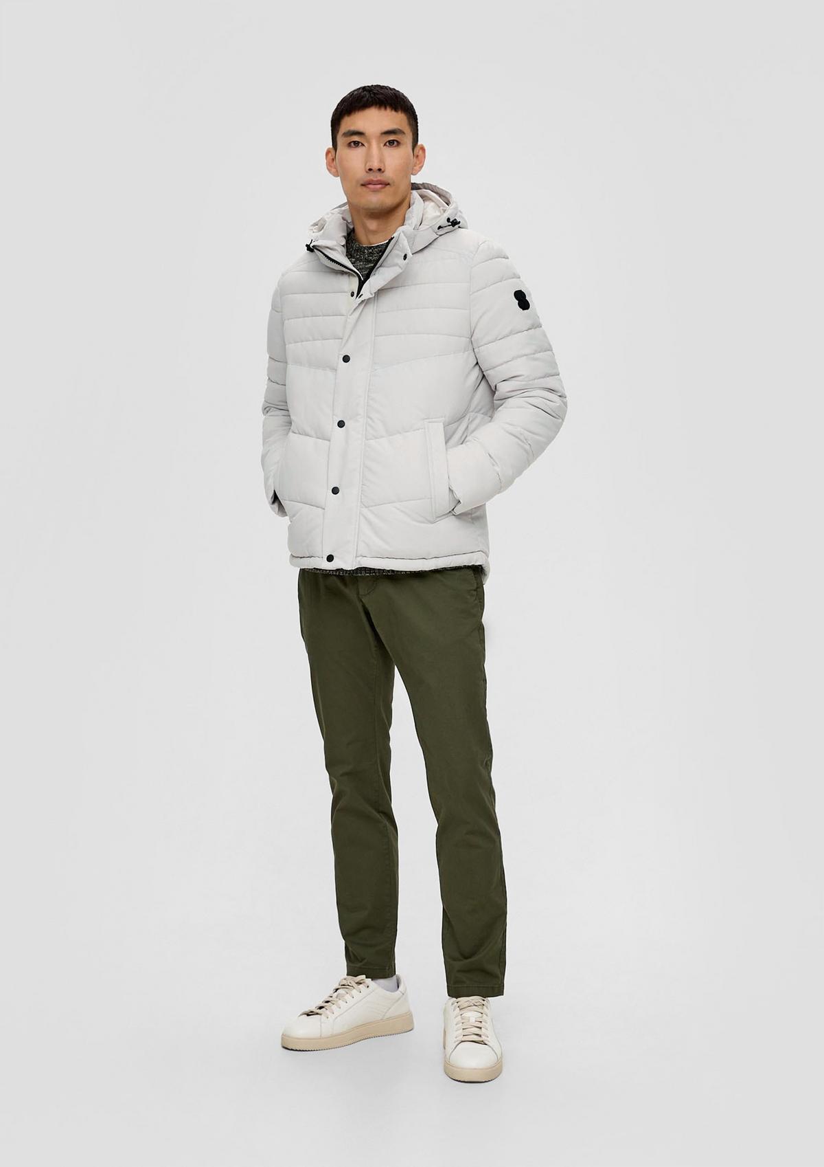 Quilted jacket with a detachable hood