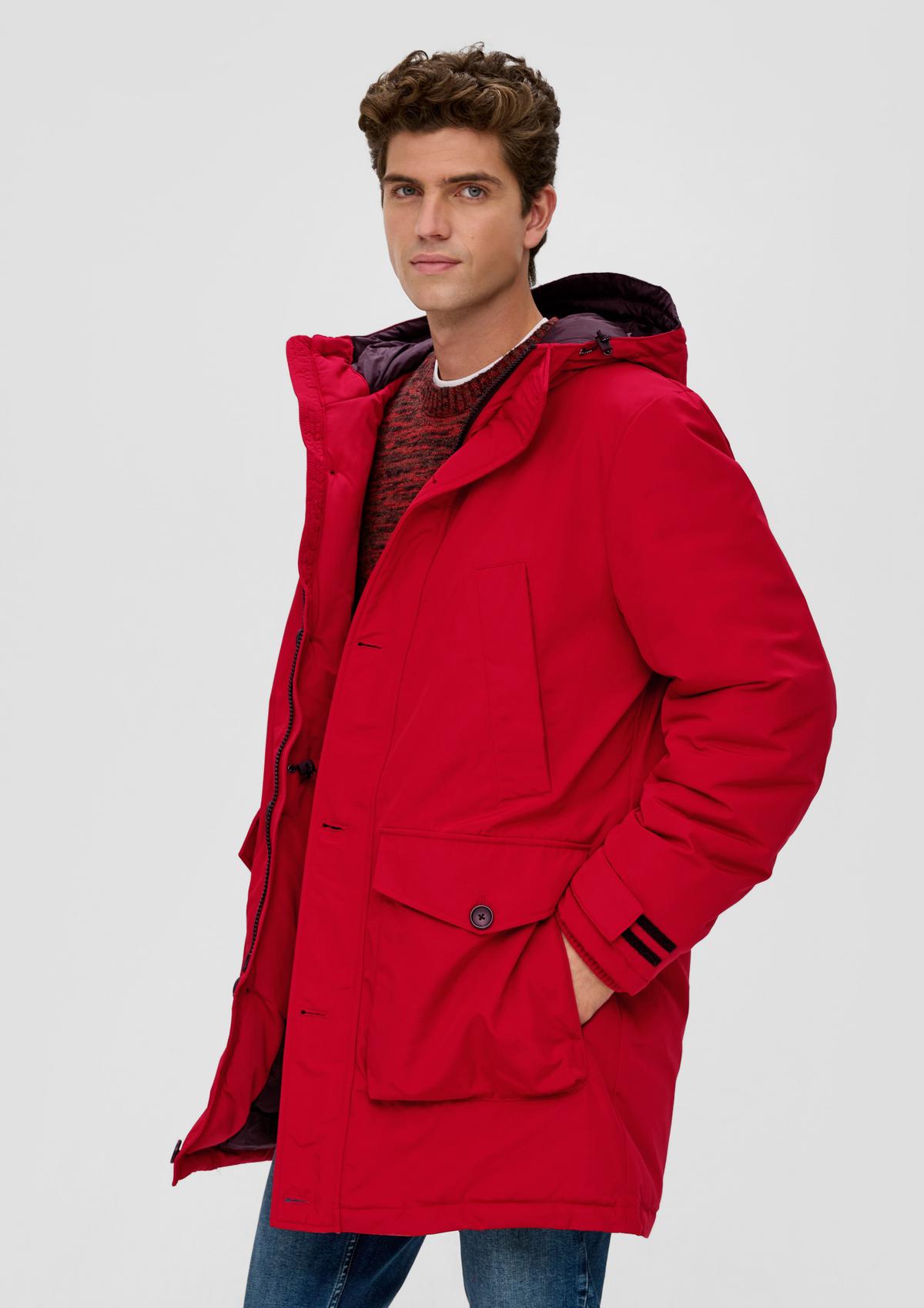 Jacket with a fixed hood