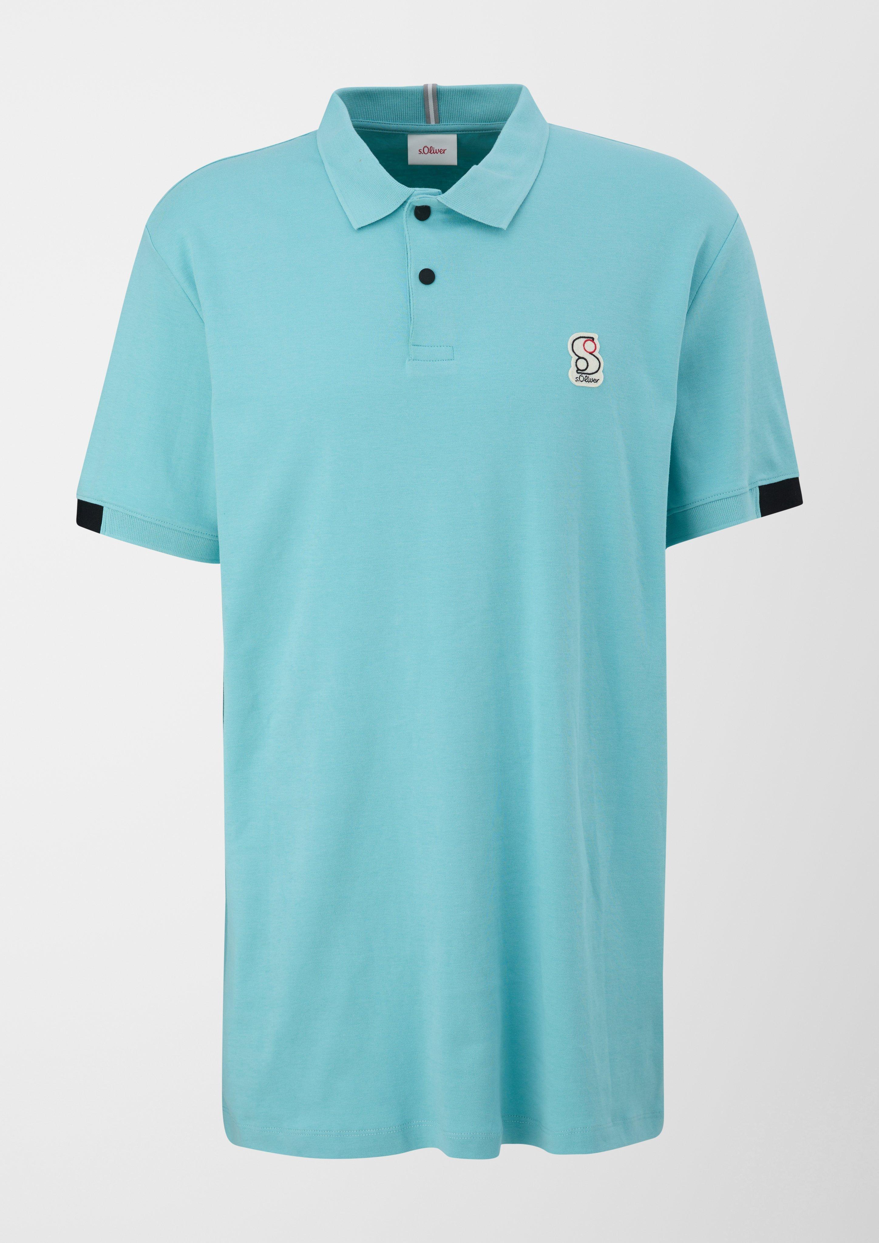 Polo shirt with navy appliqué a logo 