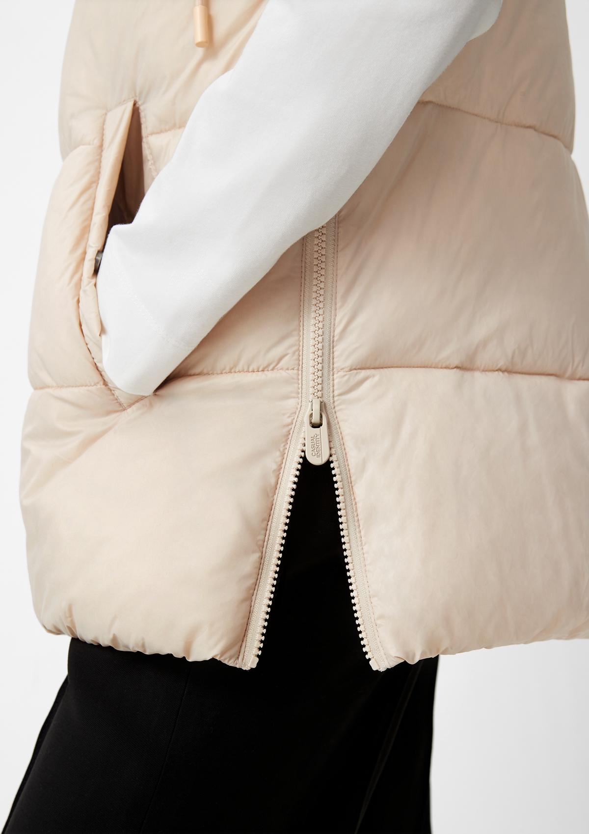 comma Quilted body warmer with detachable hood