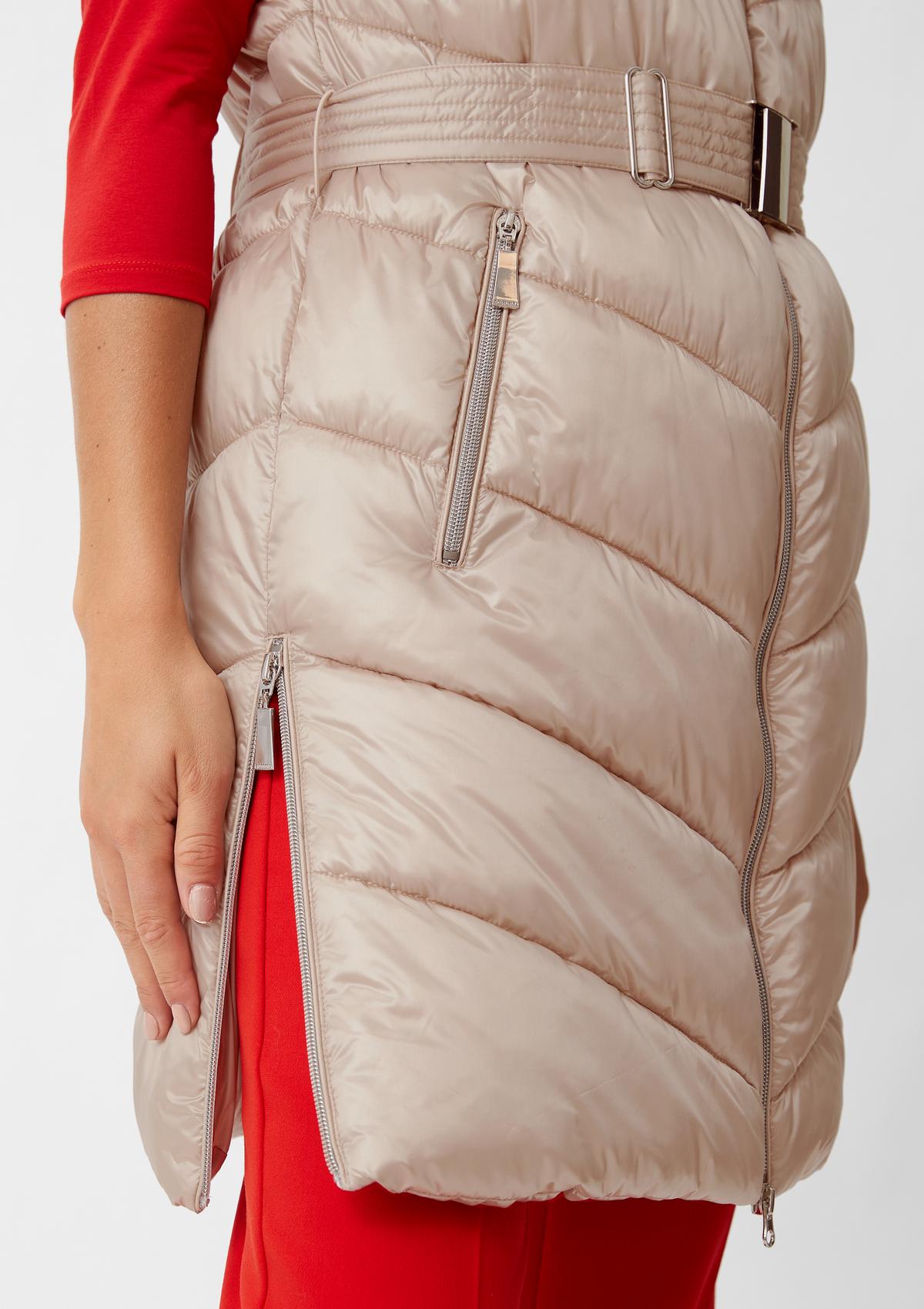 comma Long quilted body warmer with a cinch belt