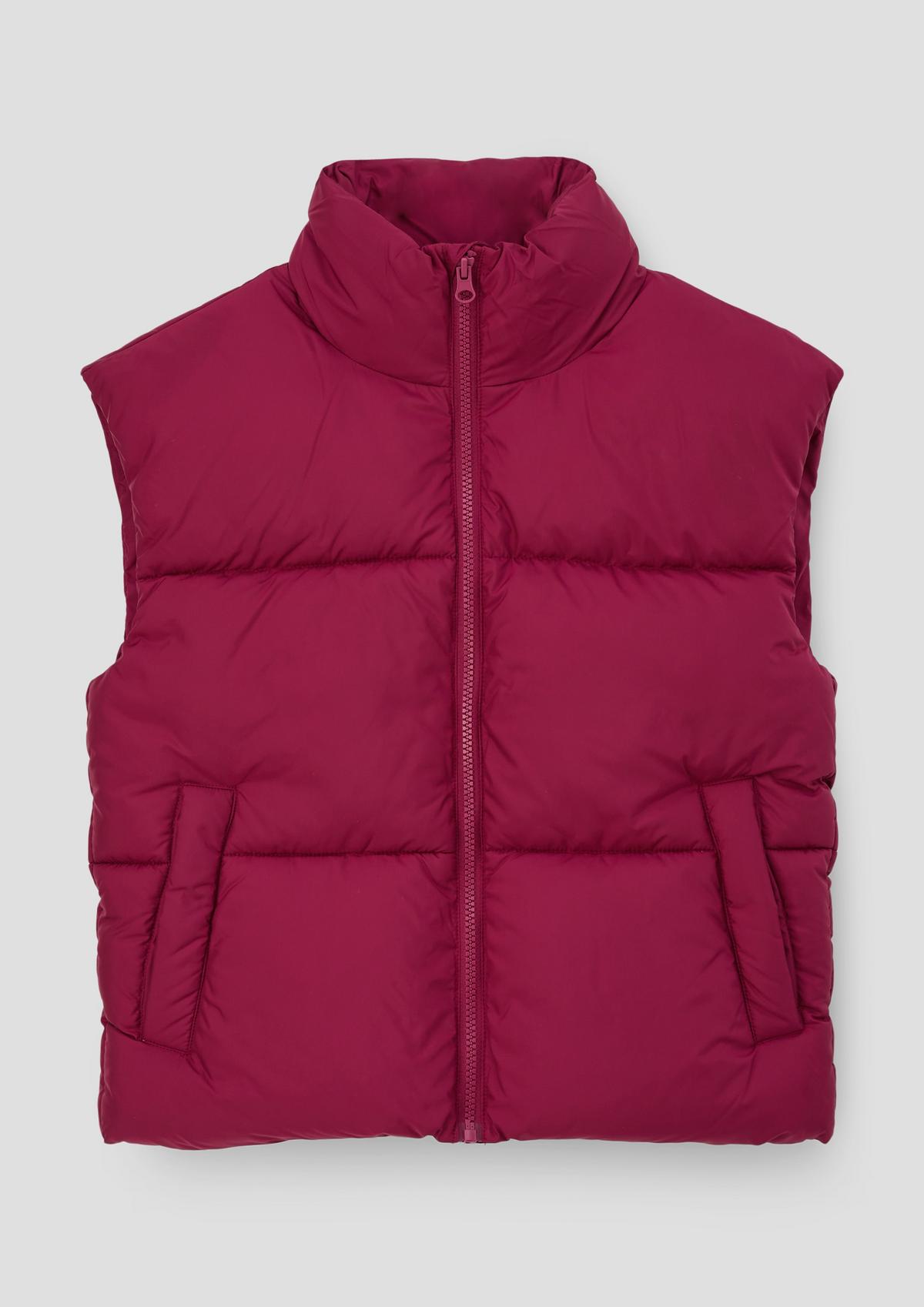 Reversible body warmer with - pink quilting