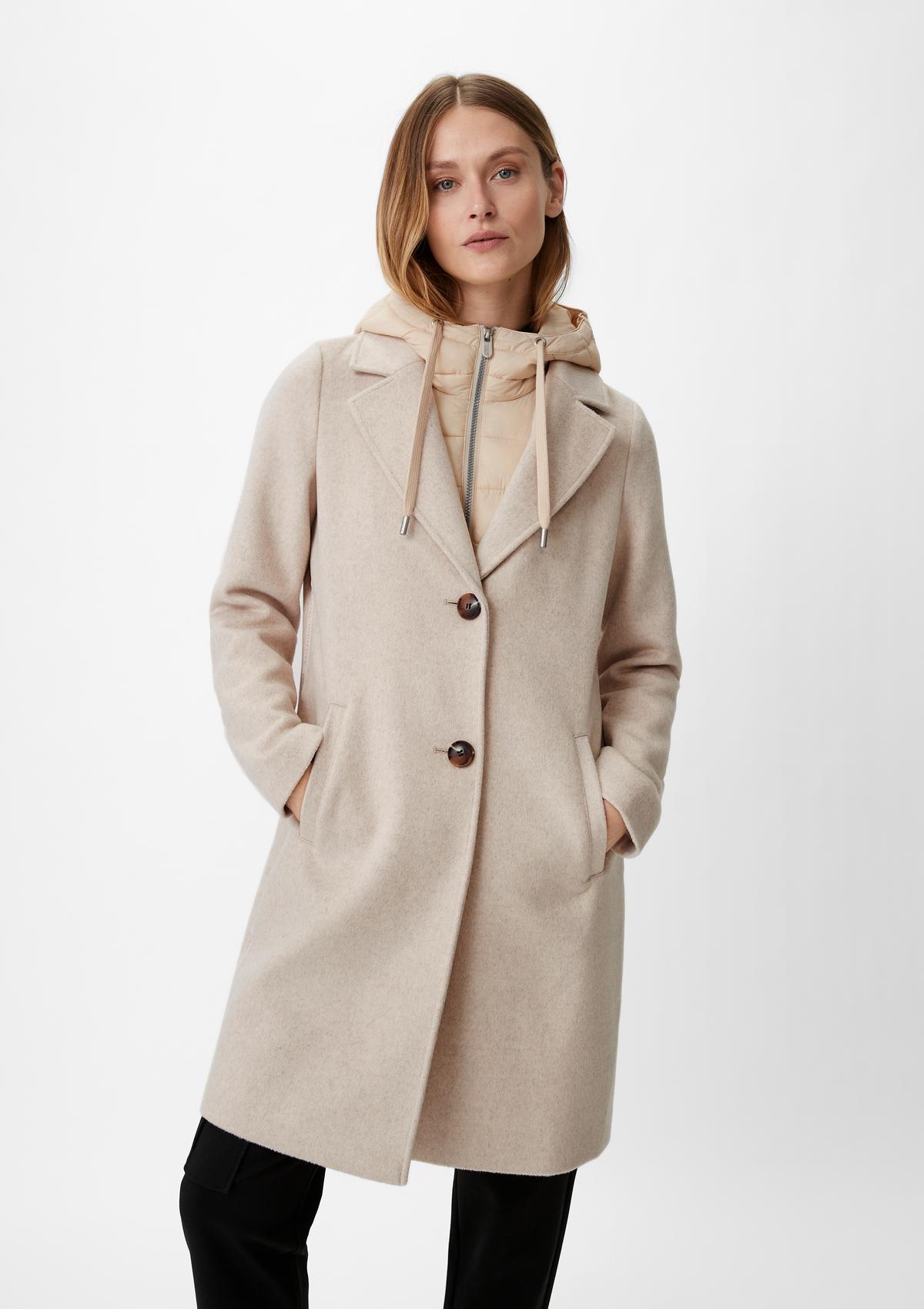 Coat with a removable insert