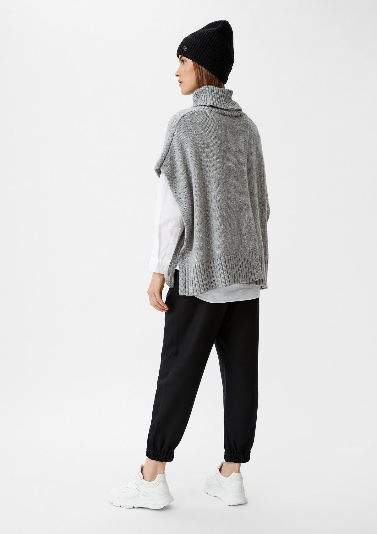 comma Knitted poncho with polo neck