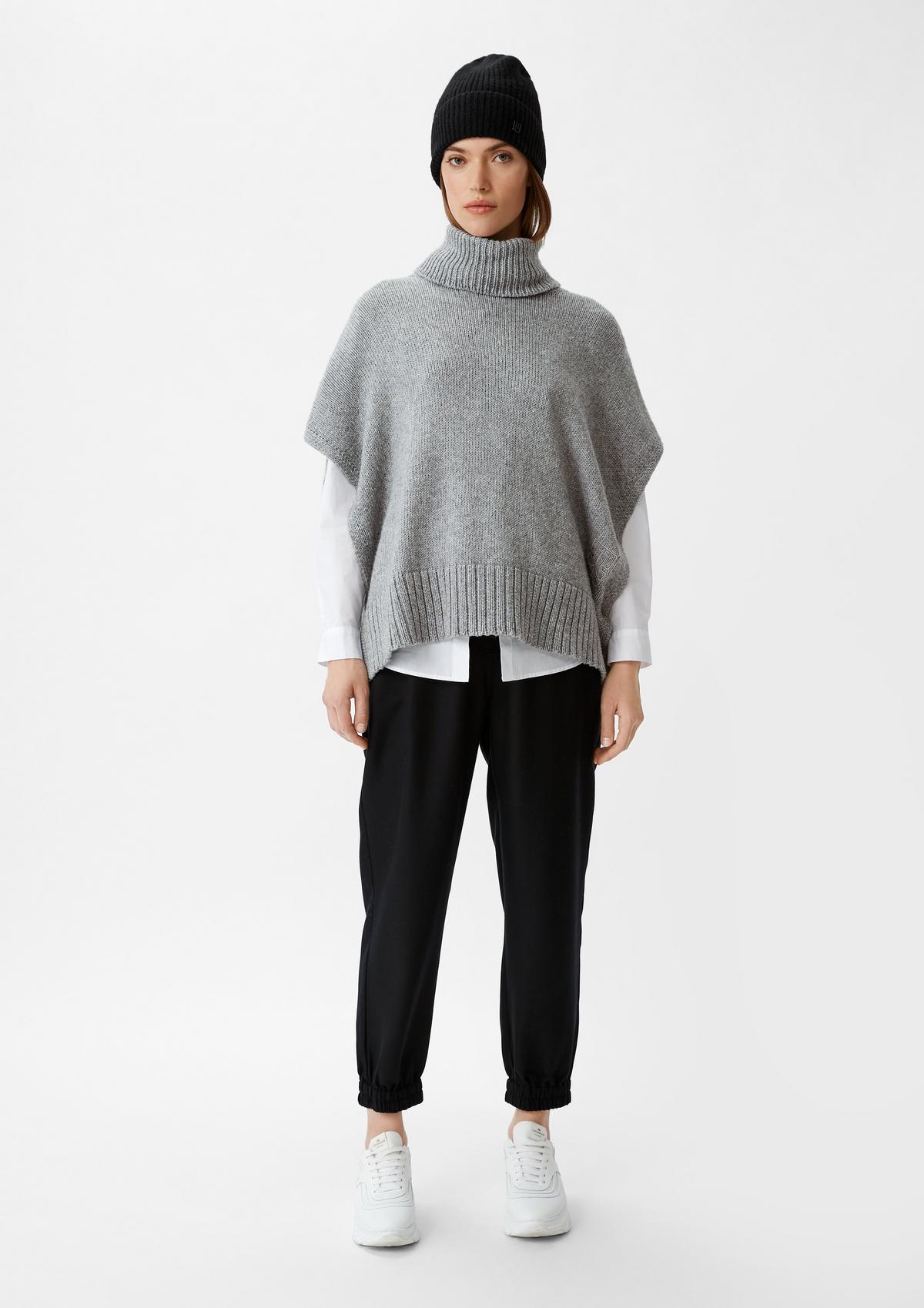 comma Knitted poncho with polo neck