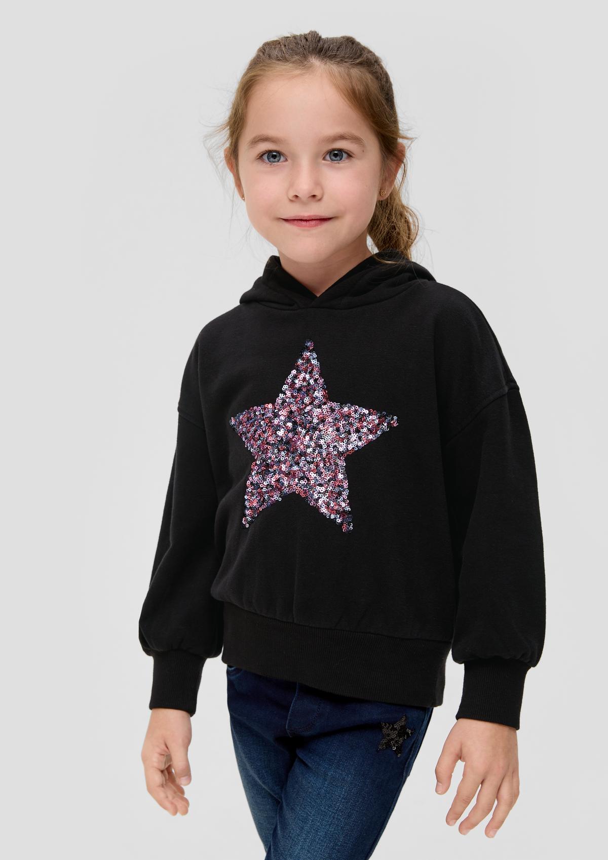 Sweatshirt with a sequin star