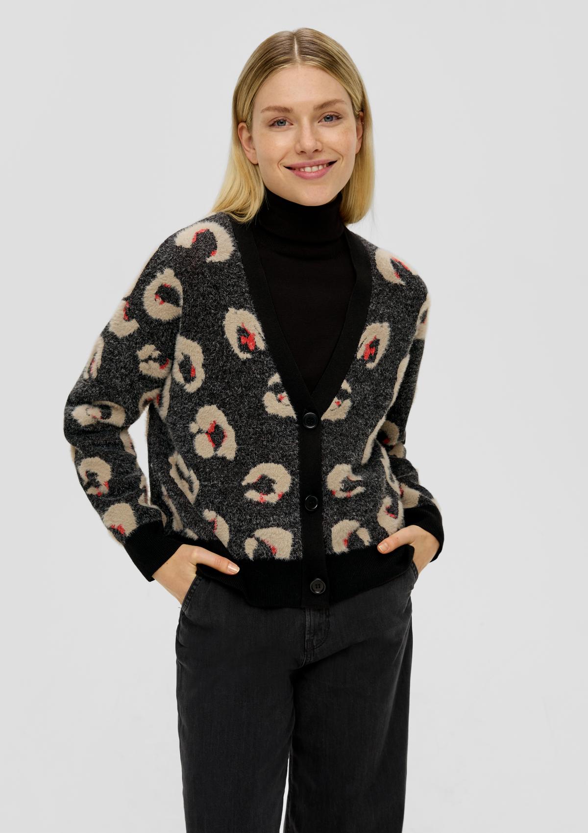 Cardigan with a leopard print pattern