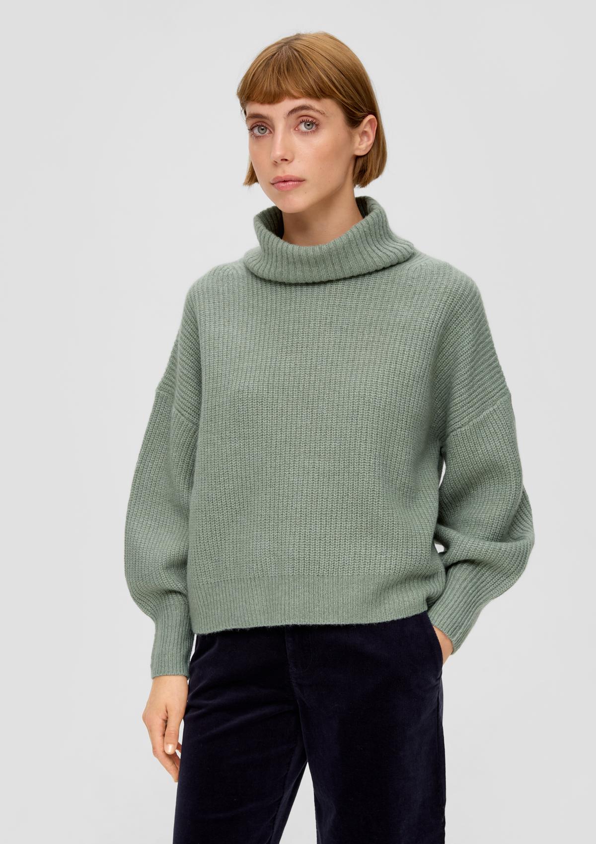 Pleten pulover v oversize kroju