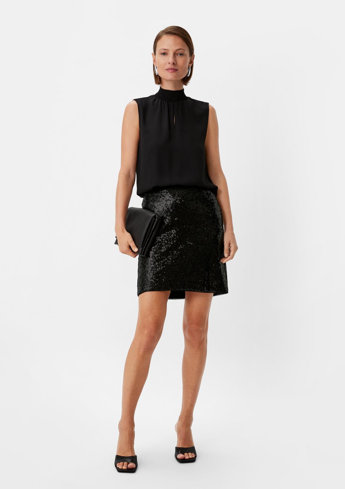 Short mesh skirt with sequins