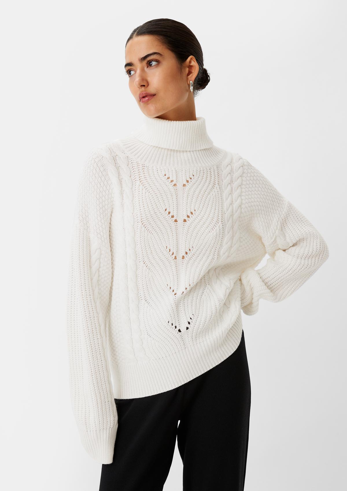 Knitted jumper with an openwork pattern