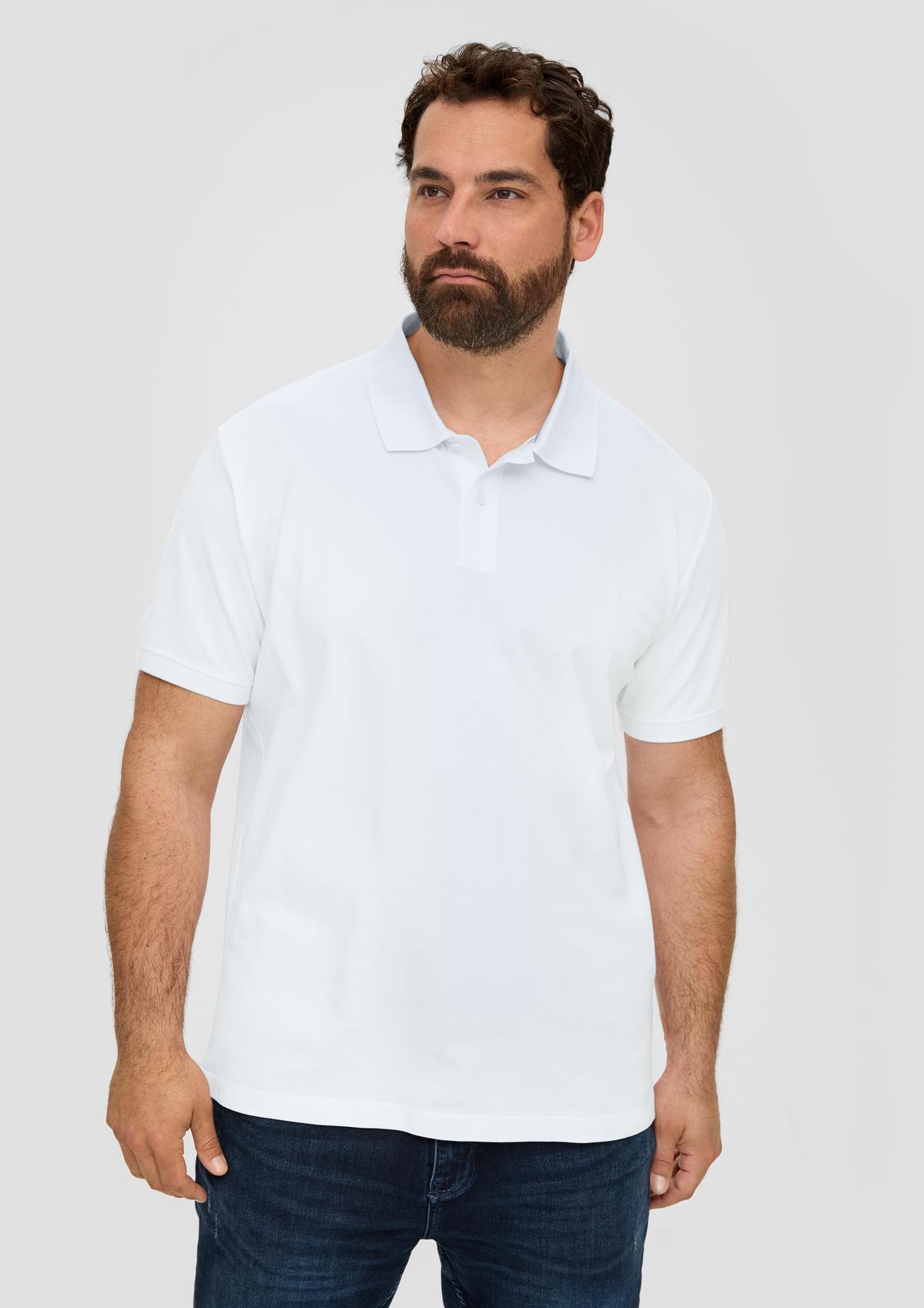 Polo - appliqué a navy with shirt logo