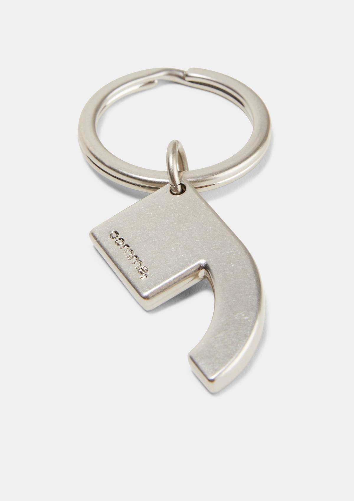 comma Small logo keyring made of metal