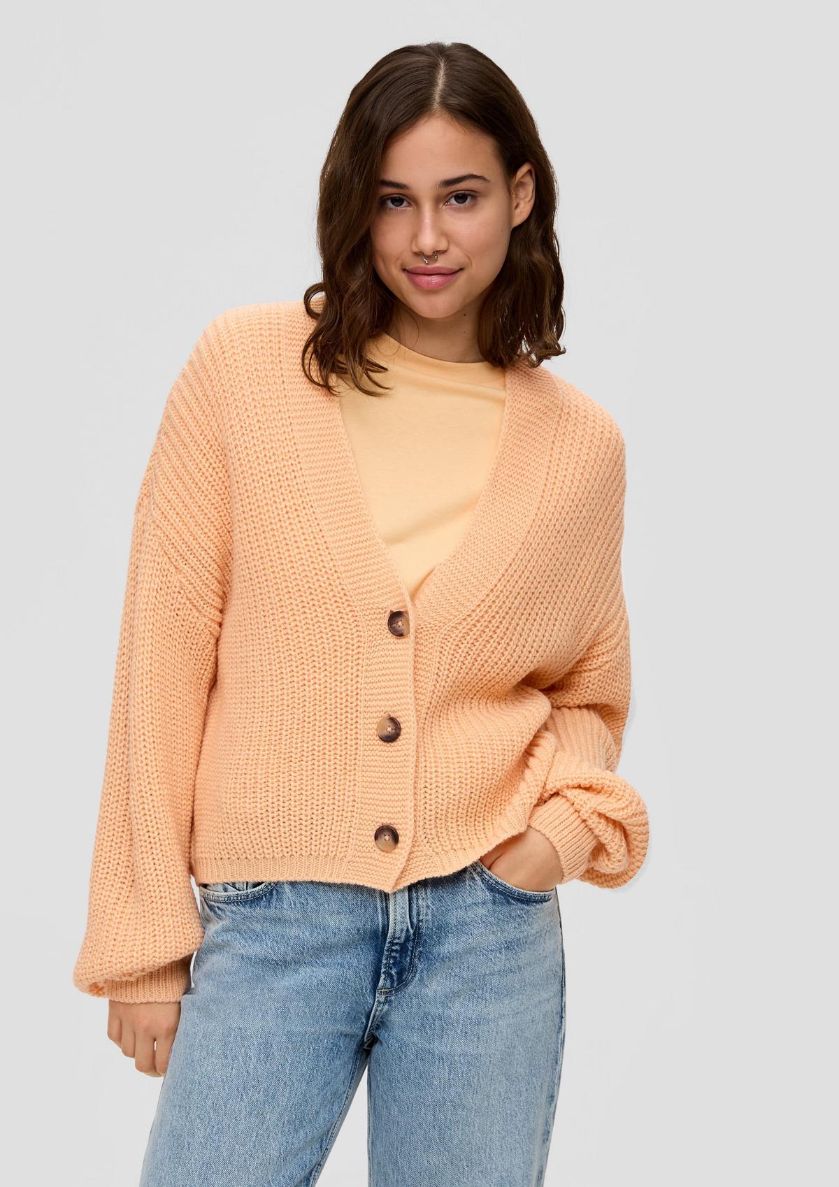 Pletený sveter s výstrihom do V
