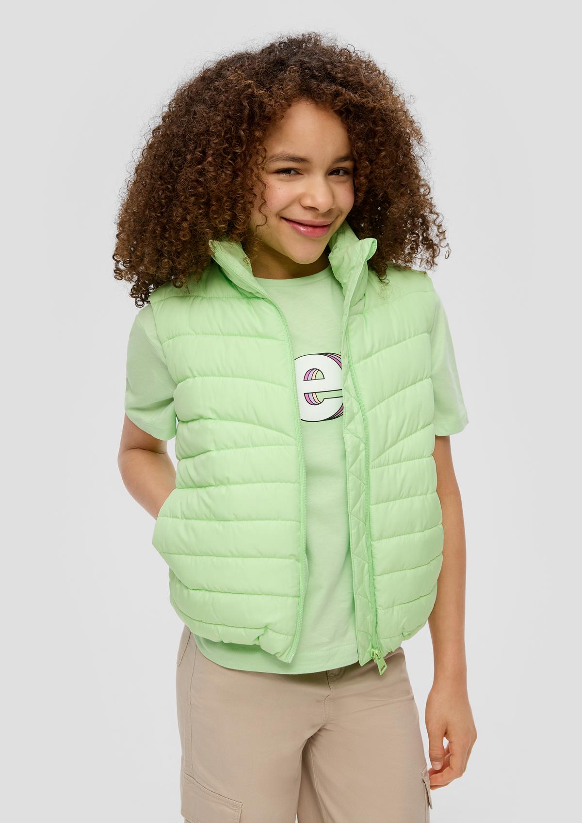 Quilted body warmer with a stand-up collar