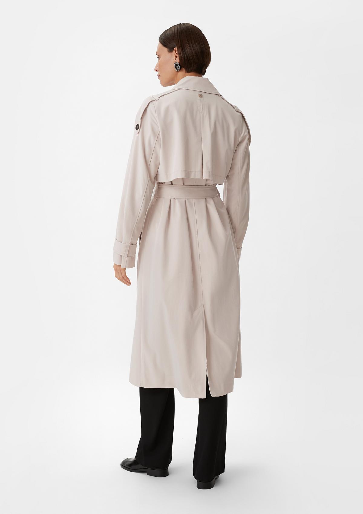 comma Trench coat with a tie-around belt
