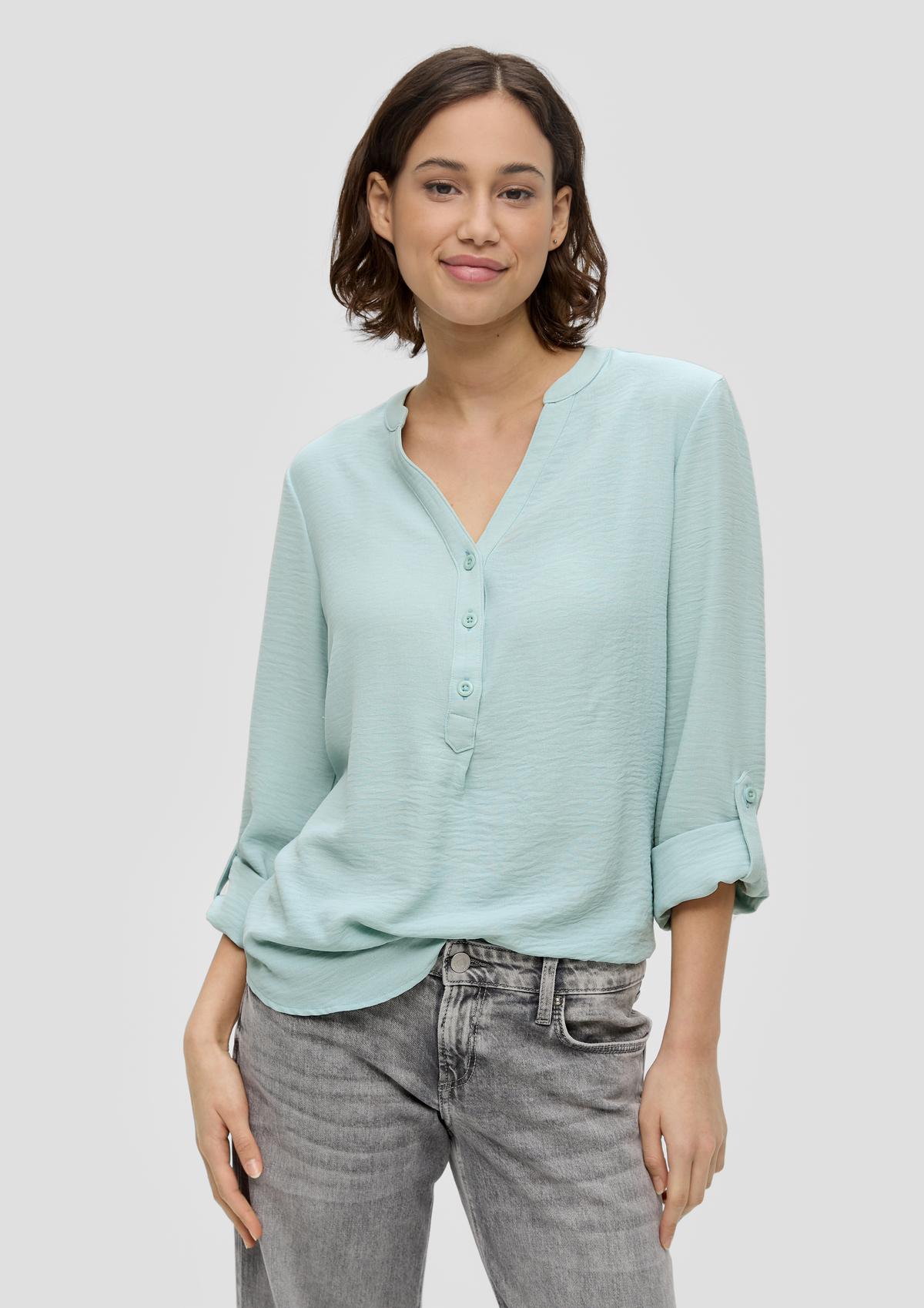 Tunic blouse with mid-length sleeves