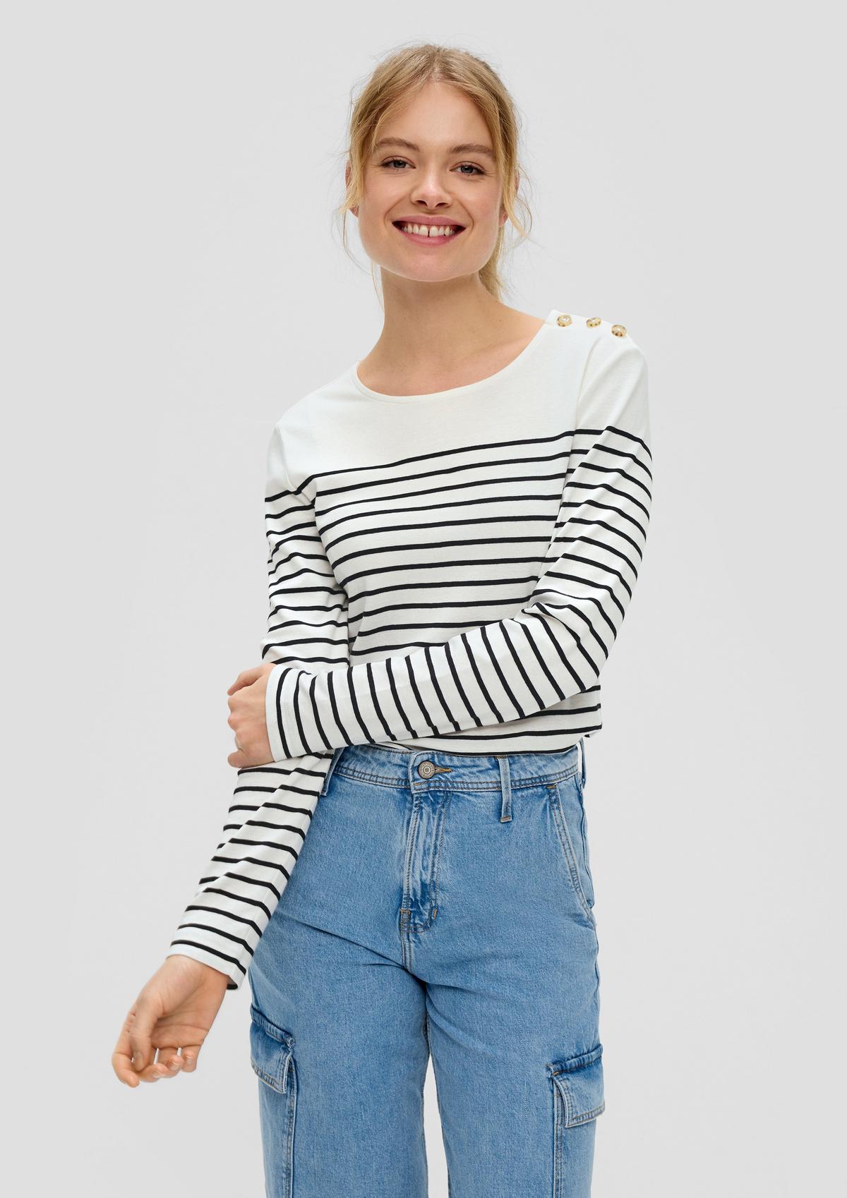 Long sleeve top with decorative buttons