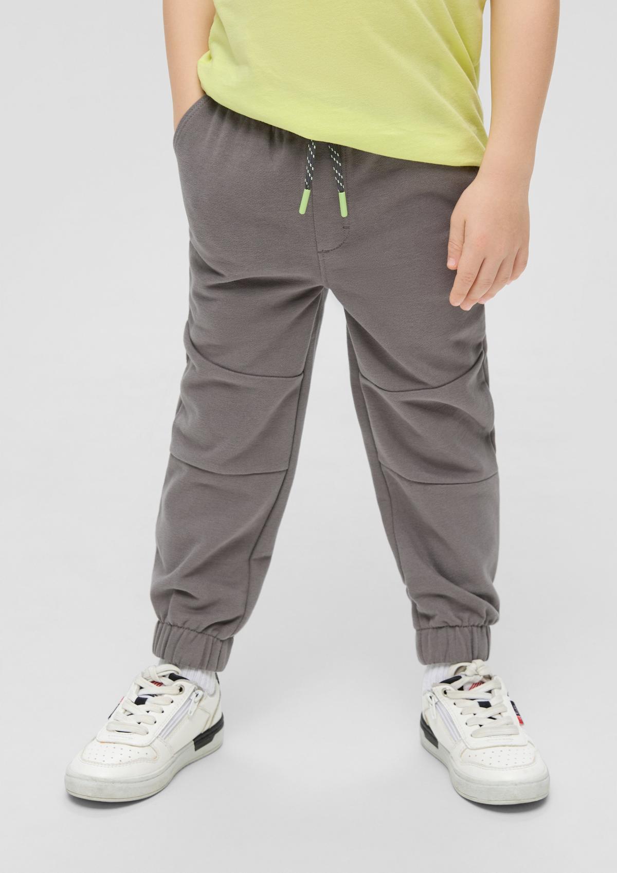 Loose fit: tracksuit bottoms with decorative stitching