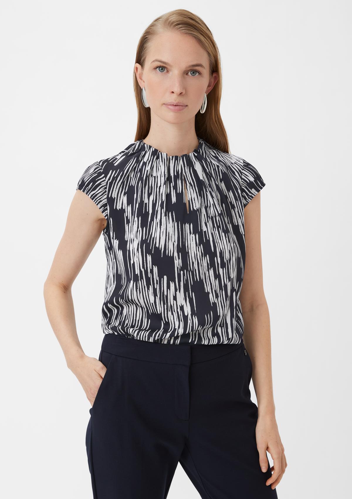 Frilled blouse with an all-over print