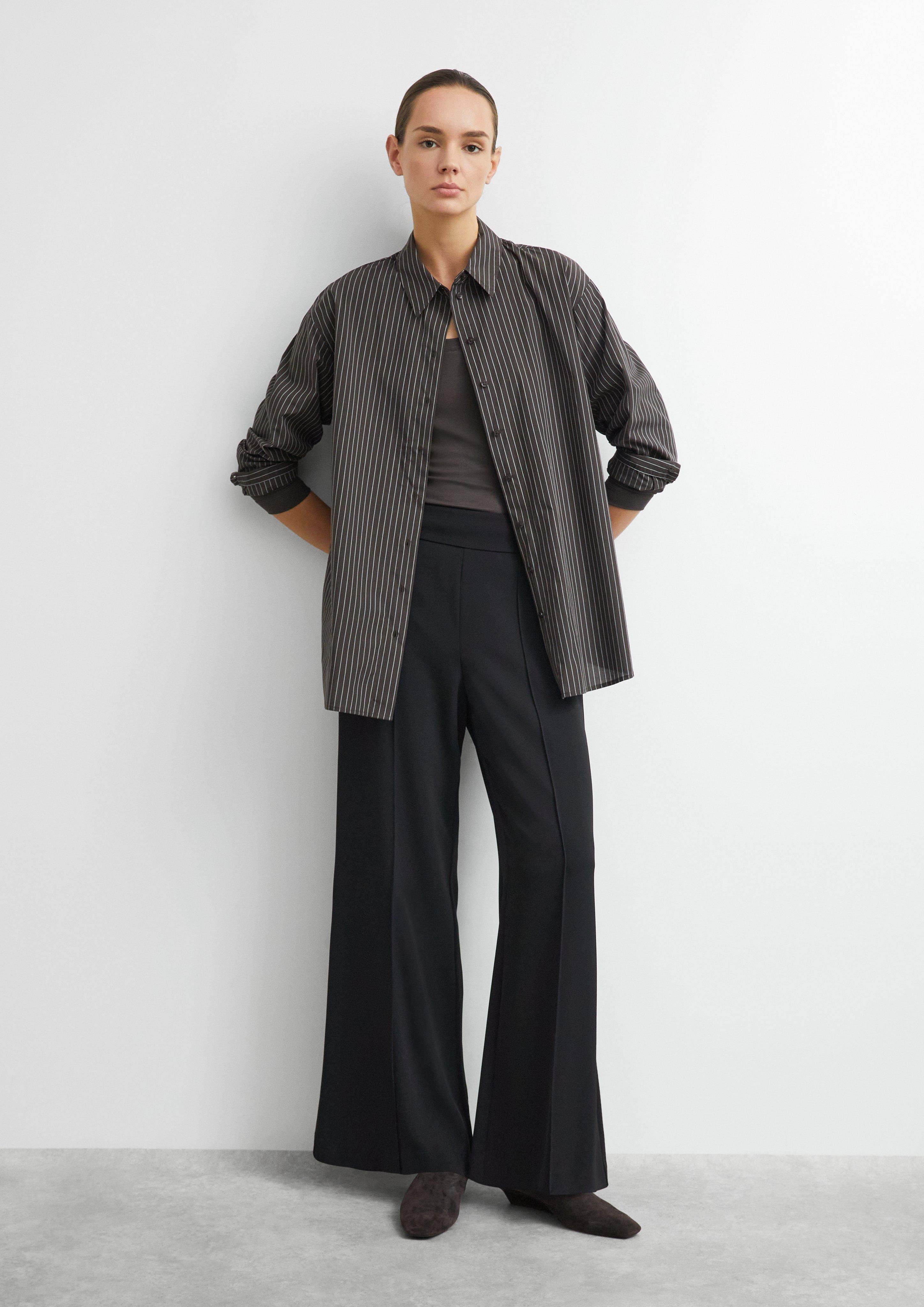 Flowing Marlene trousers with an elasticated waistband in black by COMMA