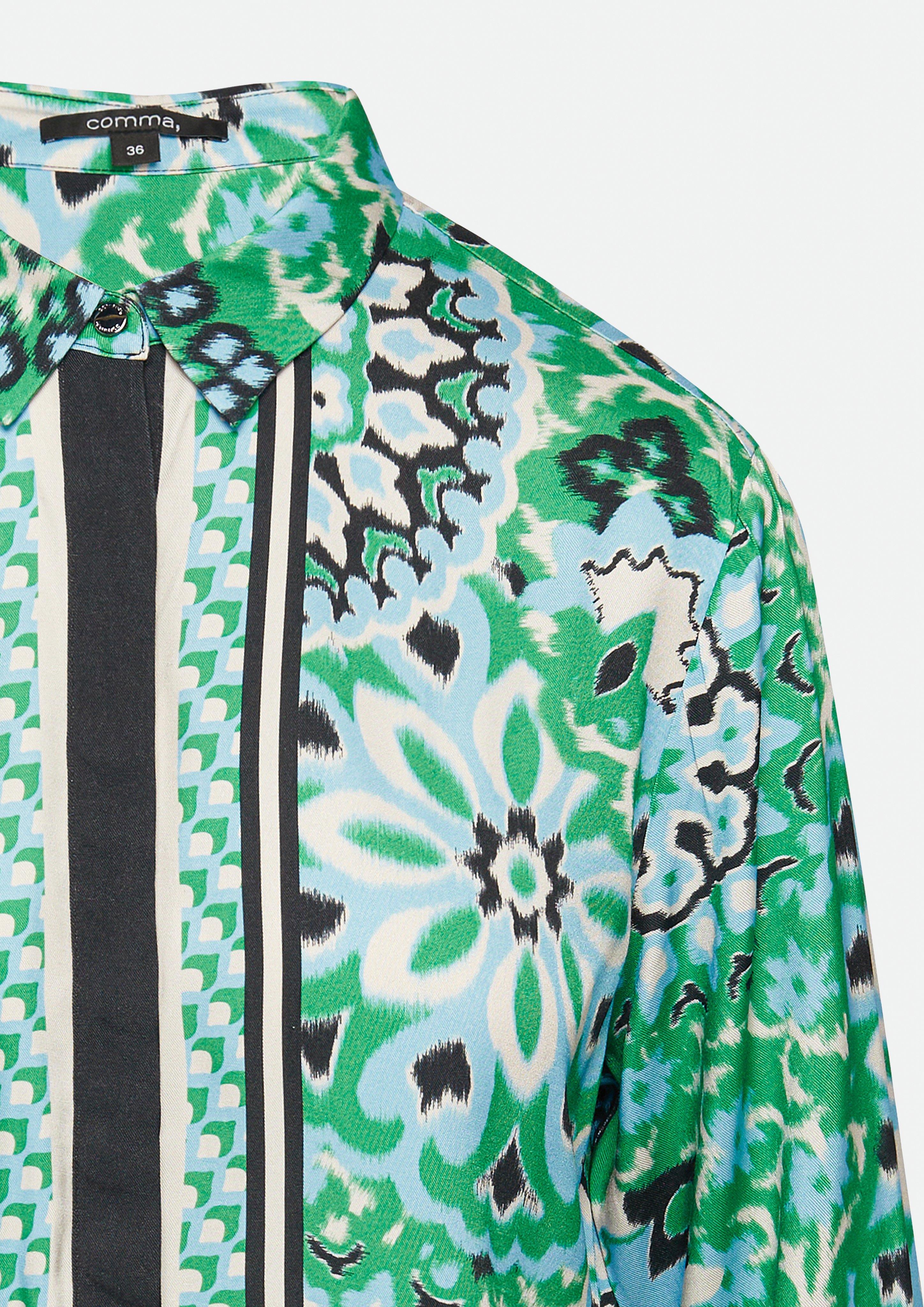 Flowing shirt blouse with concealed button placket and an Flowing shirt blouse with concealed button placket and an