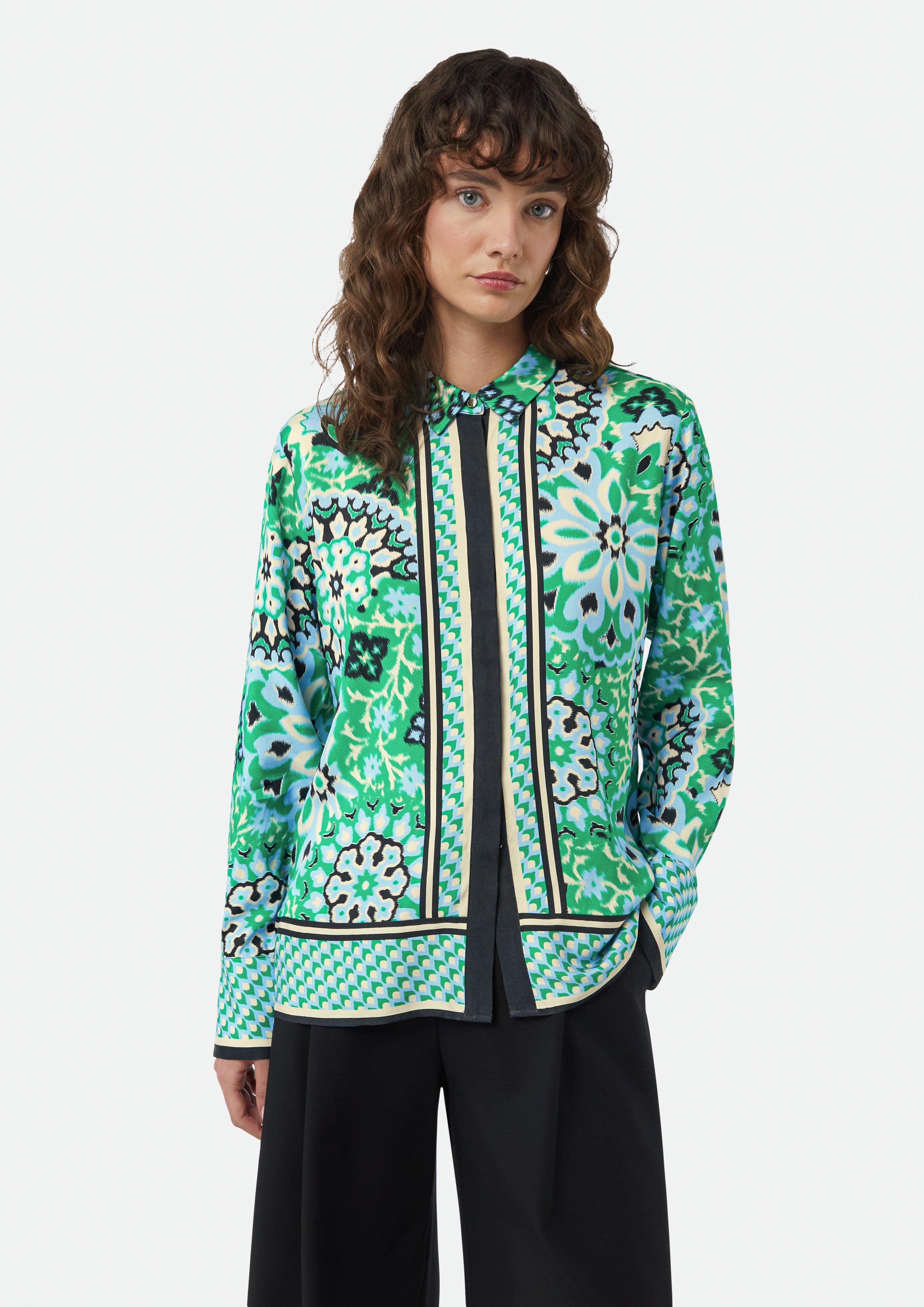 Flowing shirt blouse with concealed button placket and an Flowing shirt blouse with concealed button placket and an