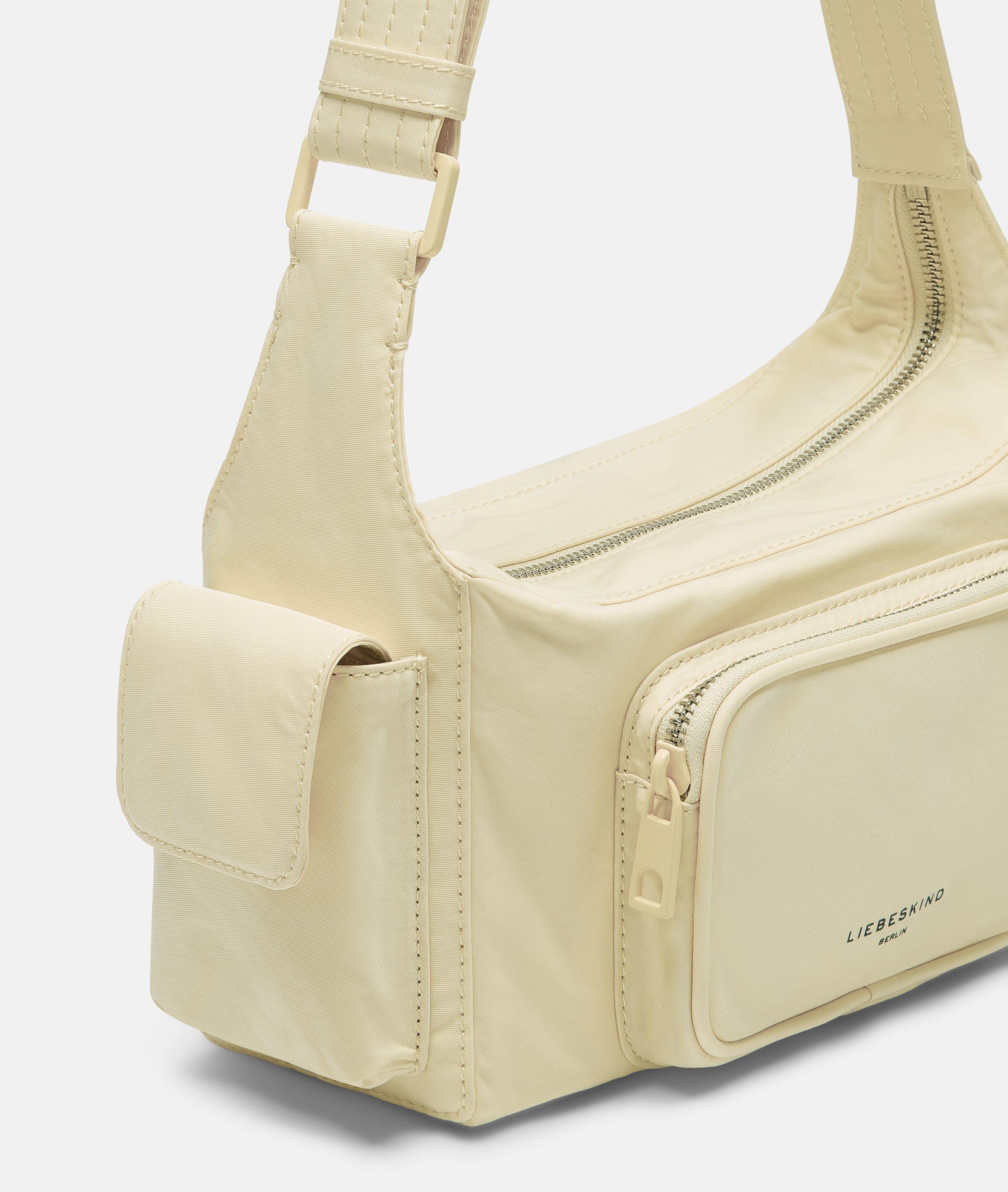 Crossbody in geel, crème, groen, oranje, zwart, blauw & blauw