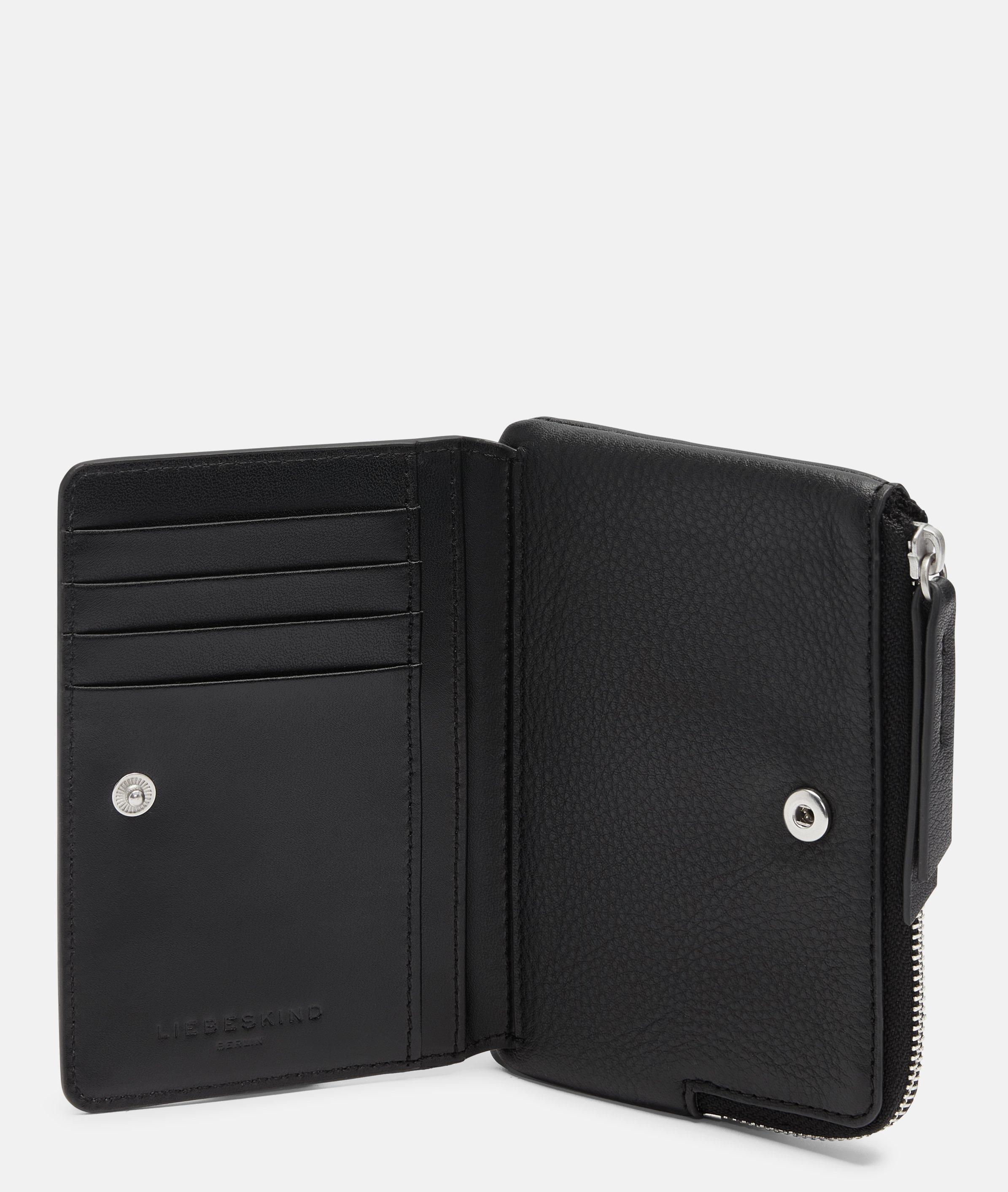 Smilla in zwart, wit, blauw & bruin