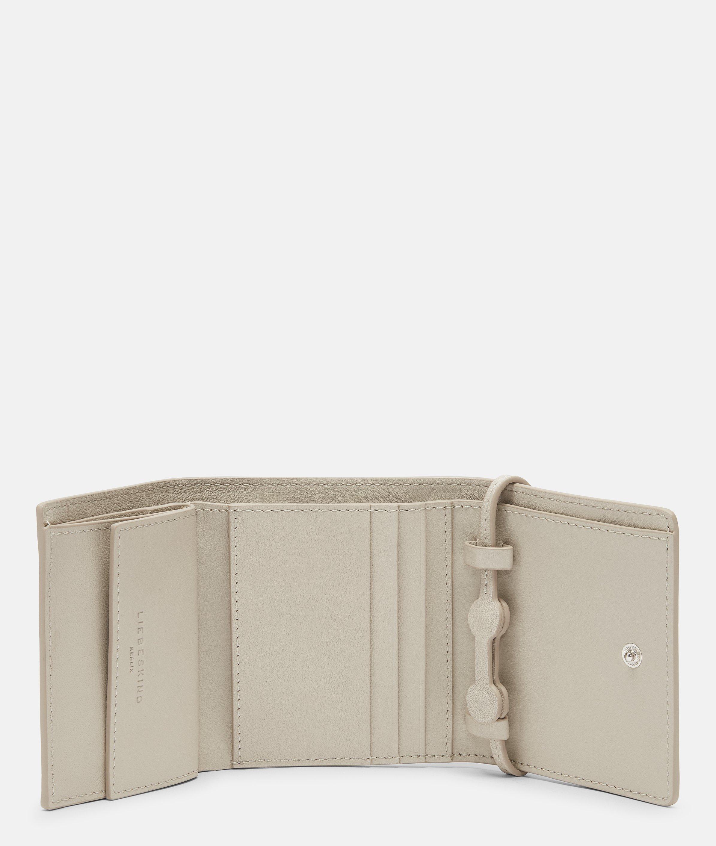 Ada in cream, blue, brown, grey, red, beige, pink & black