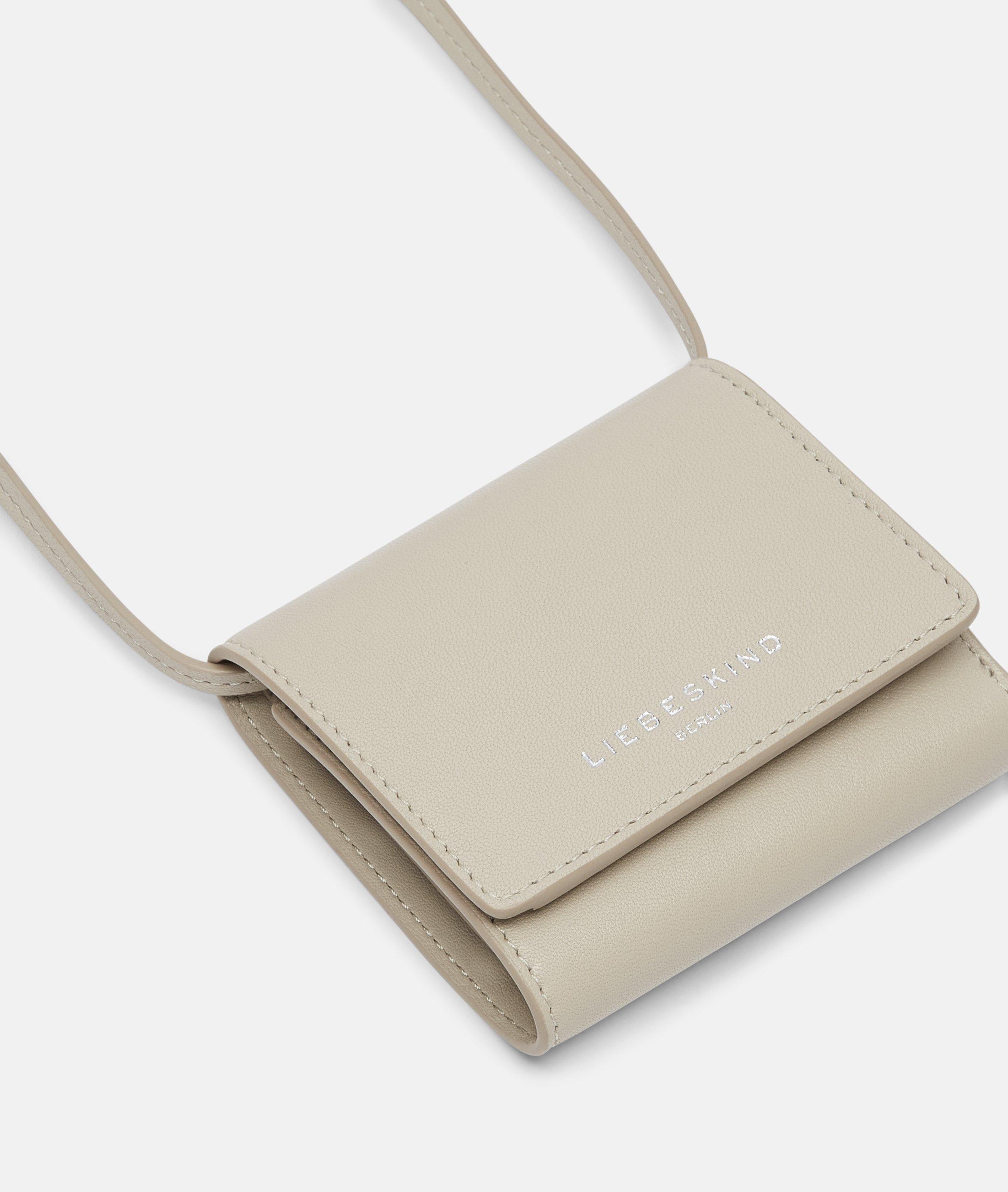 Ada in cream, blue, brown, grey, red, beige, pink & black