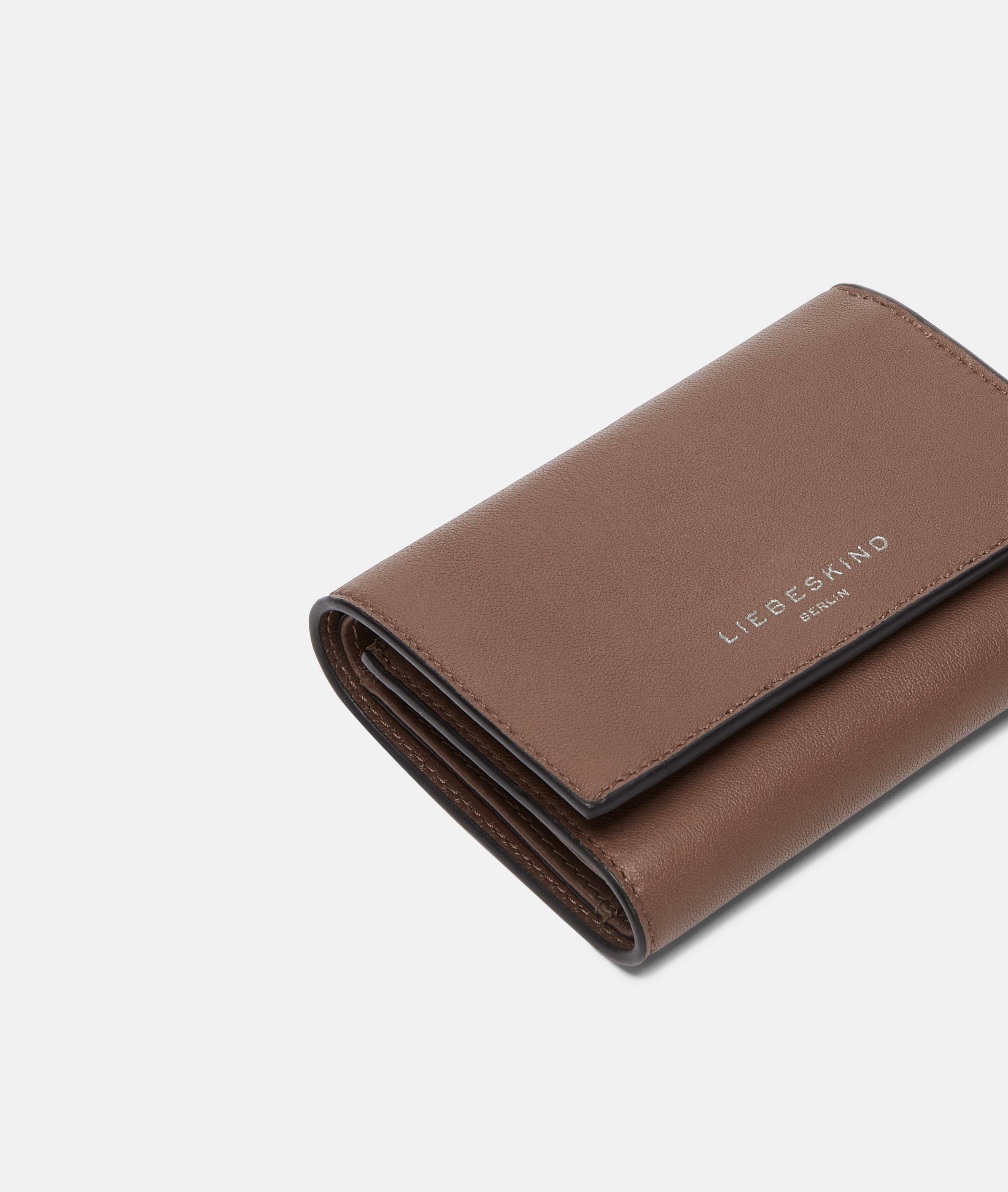 Linn in bruin, rood, grijs, blauw, zwart & beige