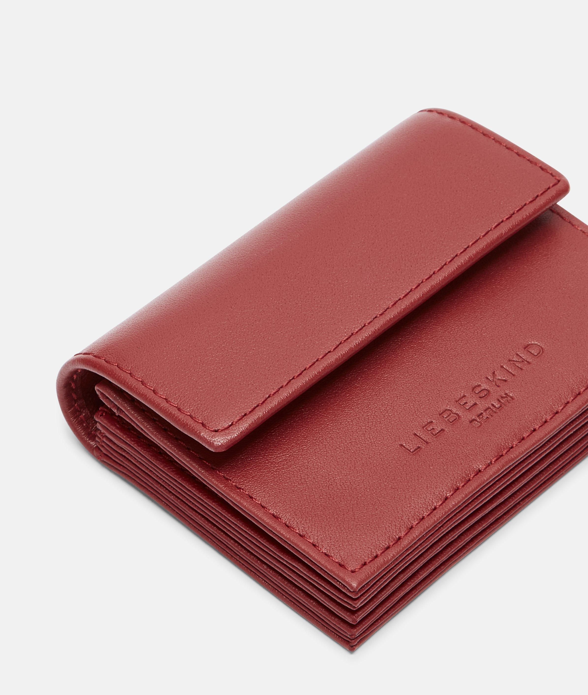 Akkordeon in rood, bruin, grijs, crème, beige, zwart & blauw