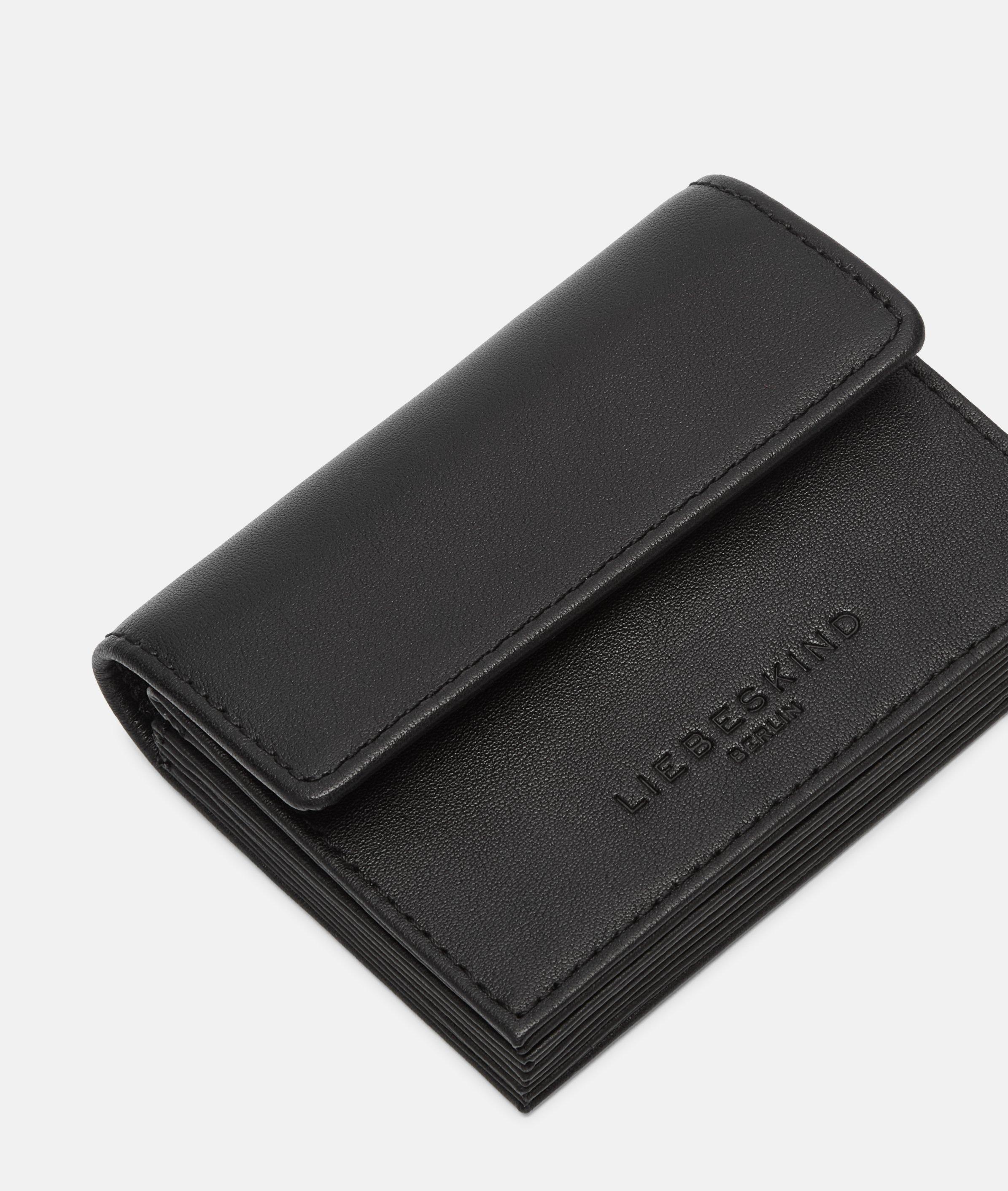 Akkordeon in zwart, bruin, grijs, crème, beige, rood & blauw