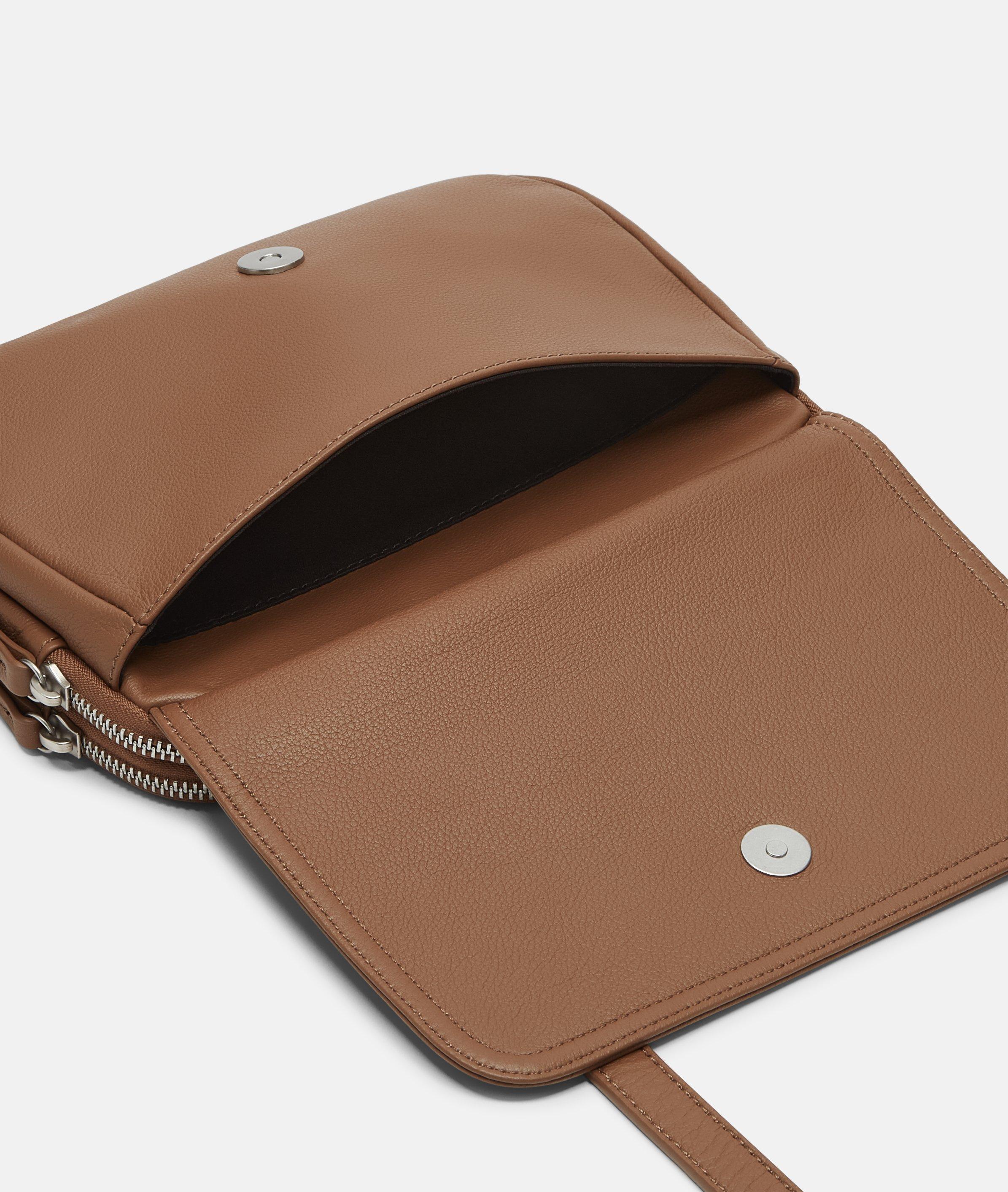 Mareike M in brown, blue, brown & olive