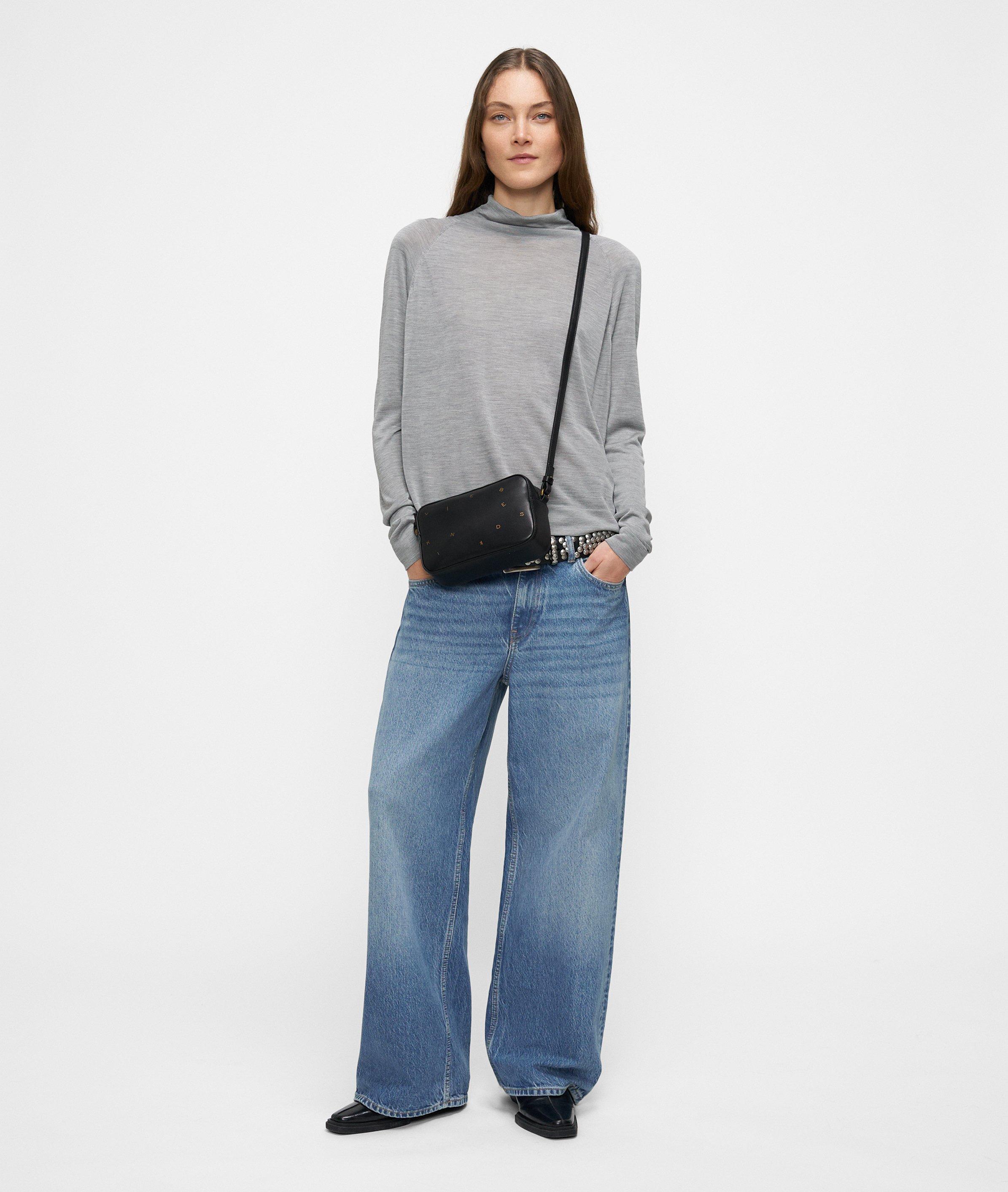 Crossbody in zwart, blauw, rood & petrol