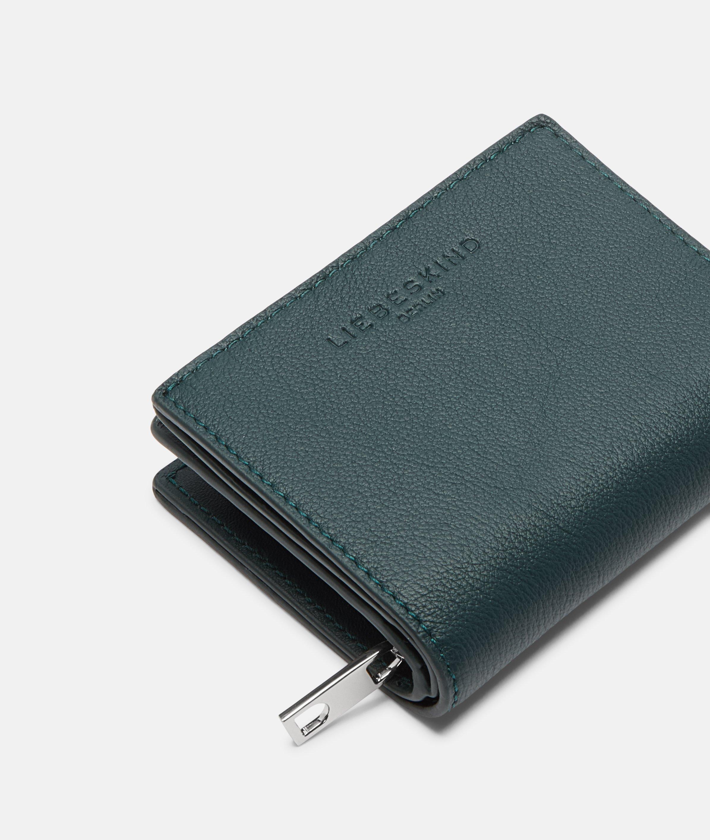 Thea beurs M in petrol, bruin, zwart, bruin & paars