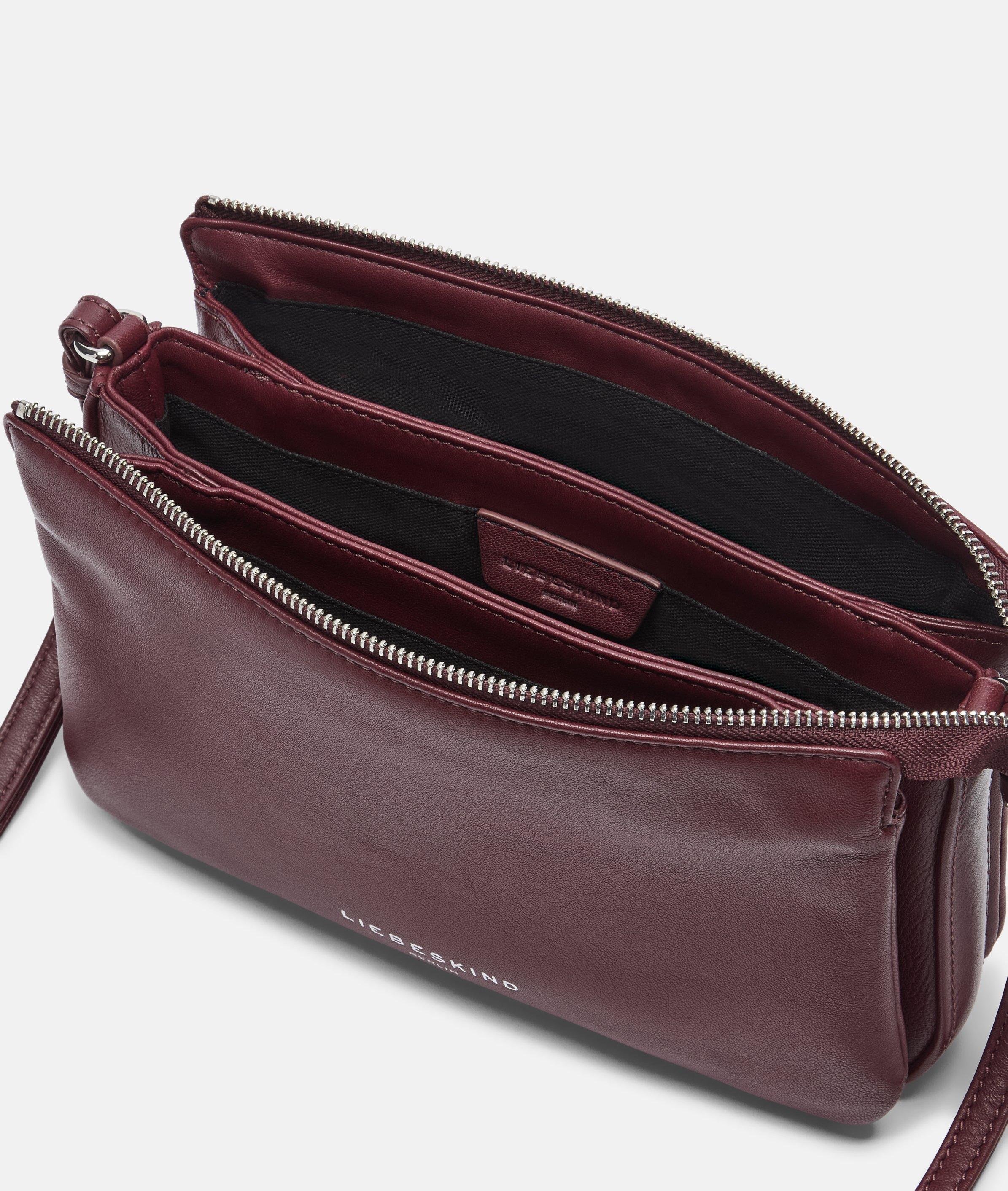 Crossbody in rood, petrol, zwart & blauw