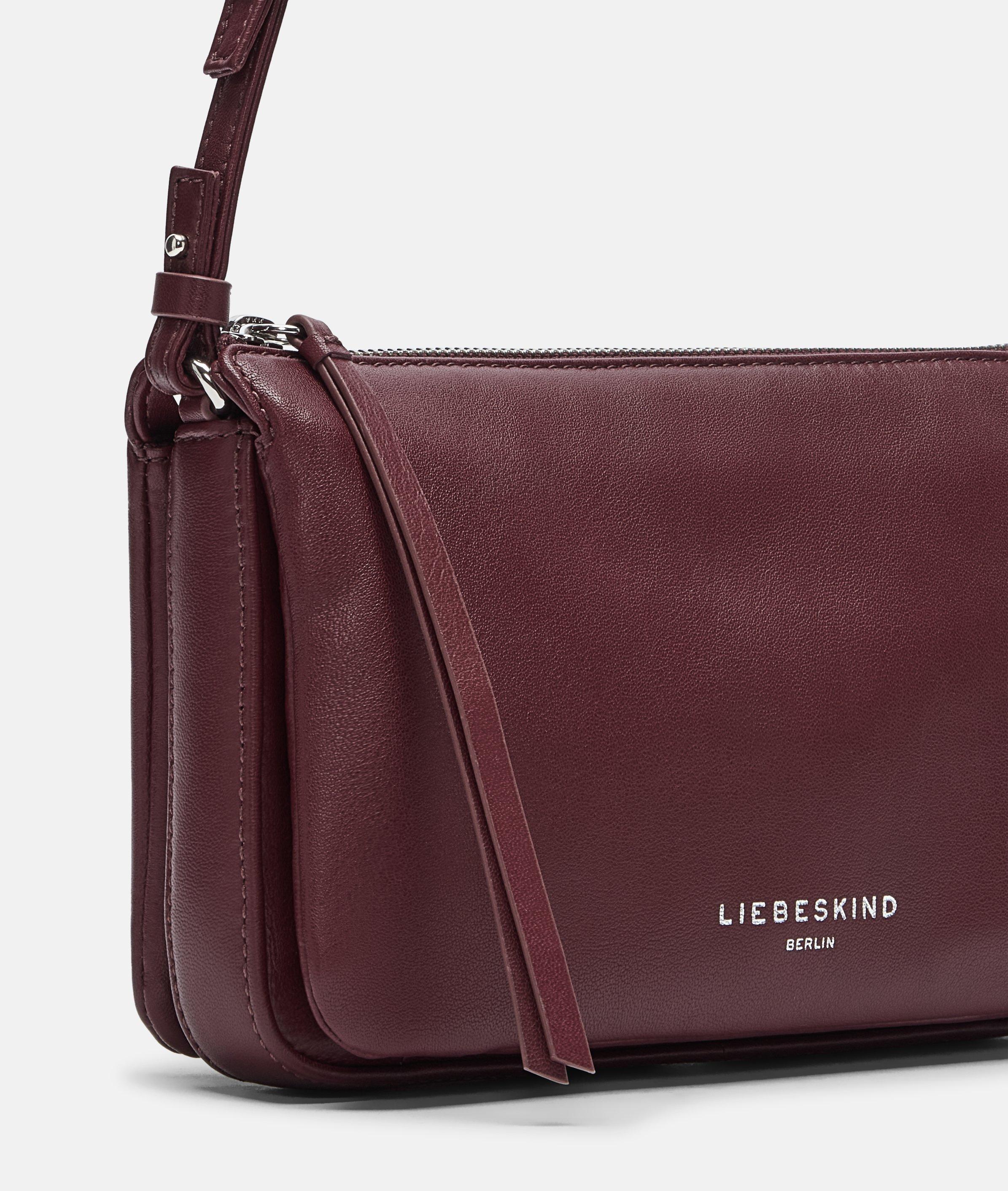 Crossbody in rood, petrol, zwart & blauw